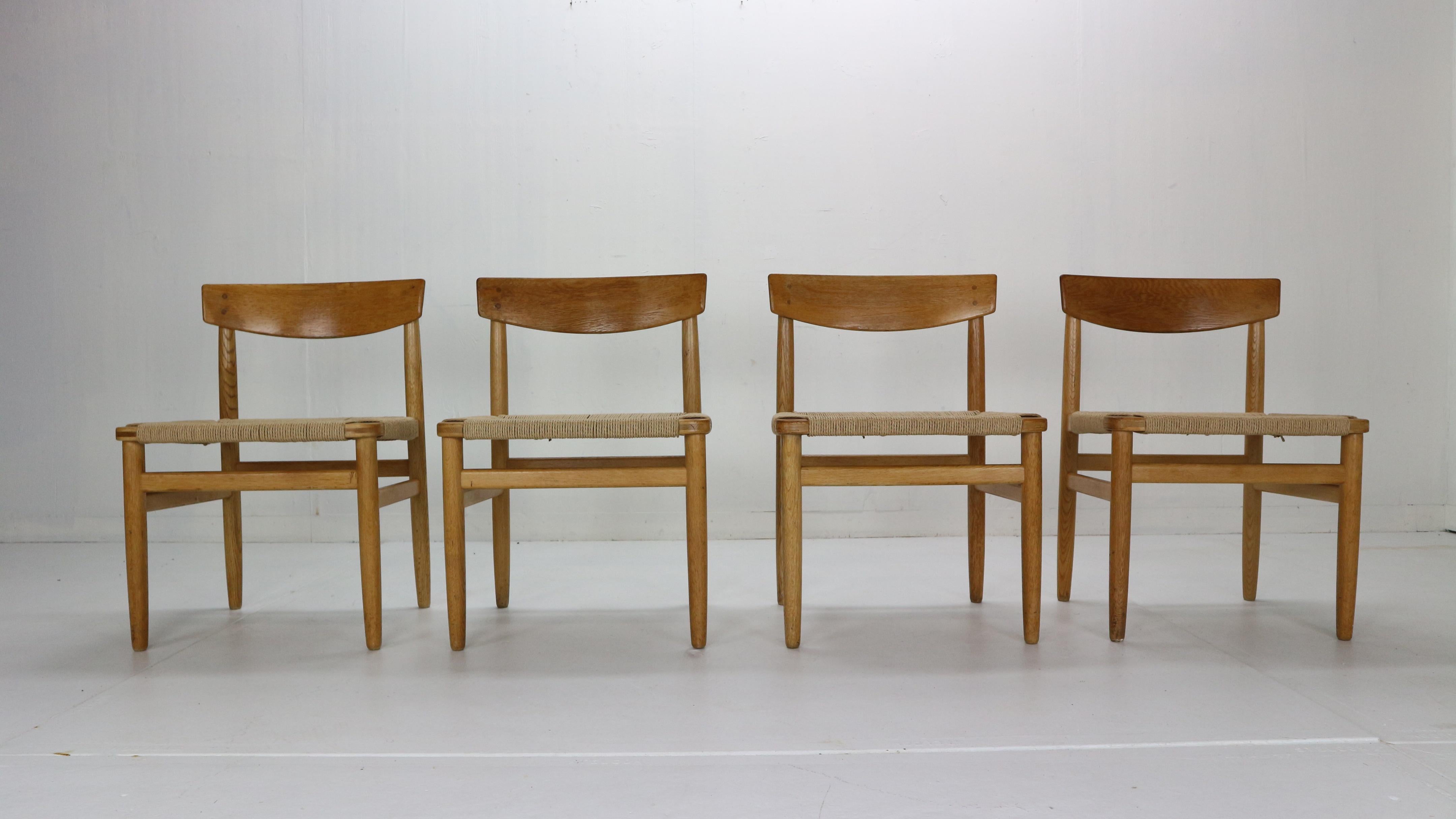 Scandinavian Modern period set of 4 dining room chairs designed by Børge Mogensen for the Øresund series, 1950s. Produced by Karl Andersson & Söner in Sweden.
Model no.- 537. The design was inspired by the American Shaker furniture. 

Solid oak