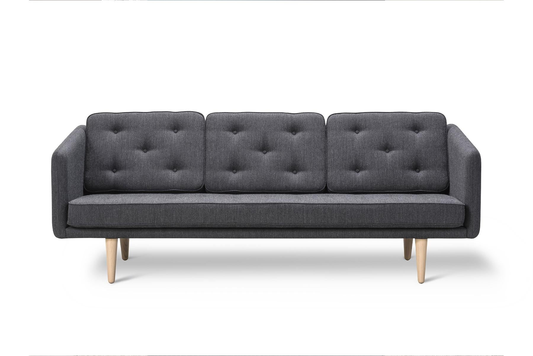 Mogensen designed the Børge Mogensen 3-seater sofa of the No.1 series in 1955. He united a sharply defined shape with a softer, more intimate character that works well as the focal point of the room.