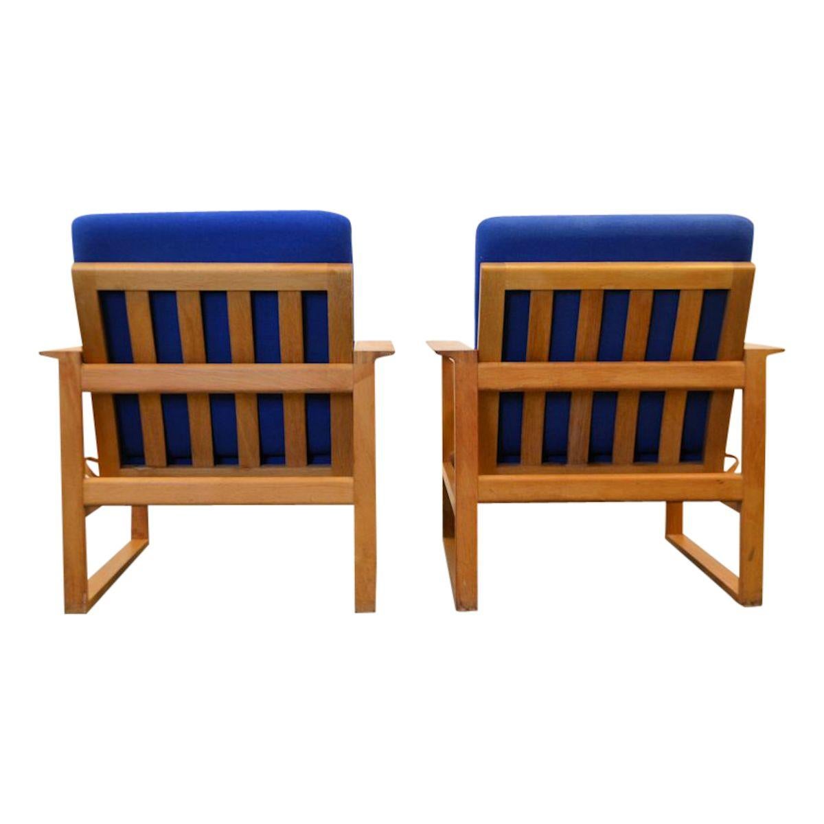 Set of two vintage Danish design lounge chairs designed by worldwide known and appreciated furniture designer Børge Mogensen for manufacturer Fredericia Stolefabrik. Featuring Mogensen was one of the most important among a generation of furniture