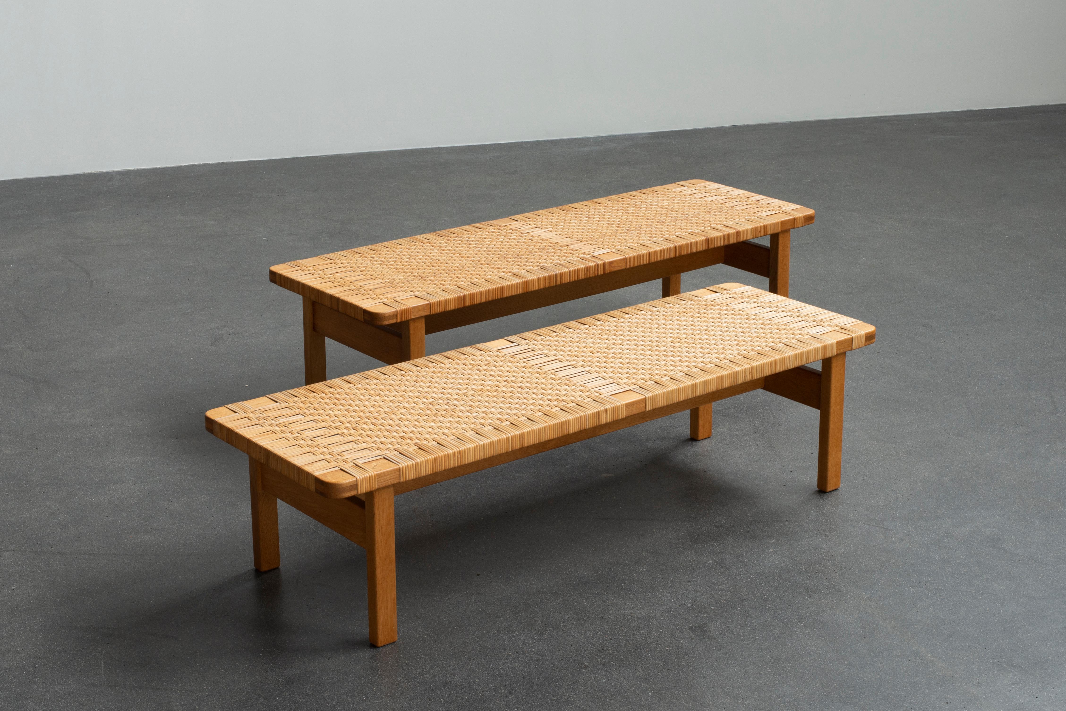 Børge Mogensen a pair of oak benches with top of woven cane. Manufactured by Fredericia Furniture.