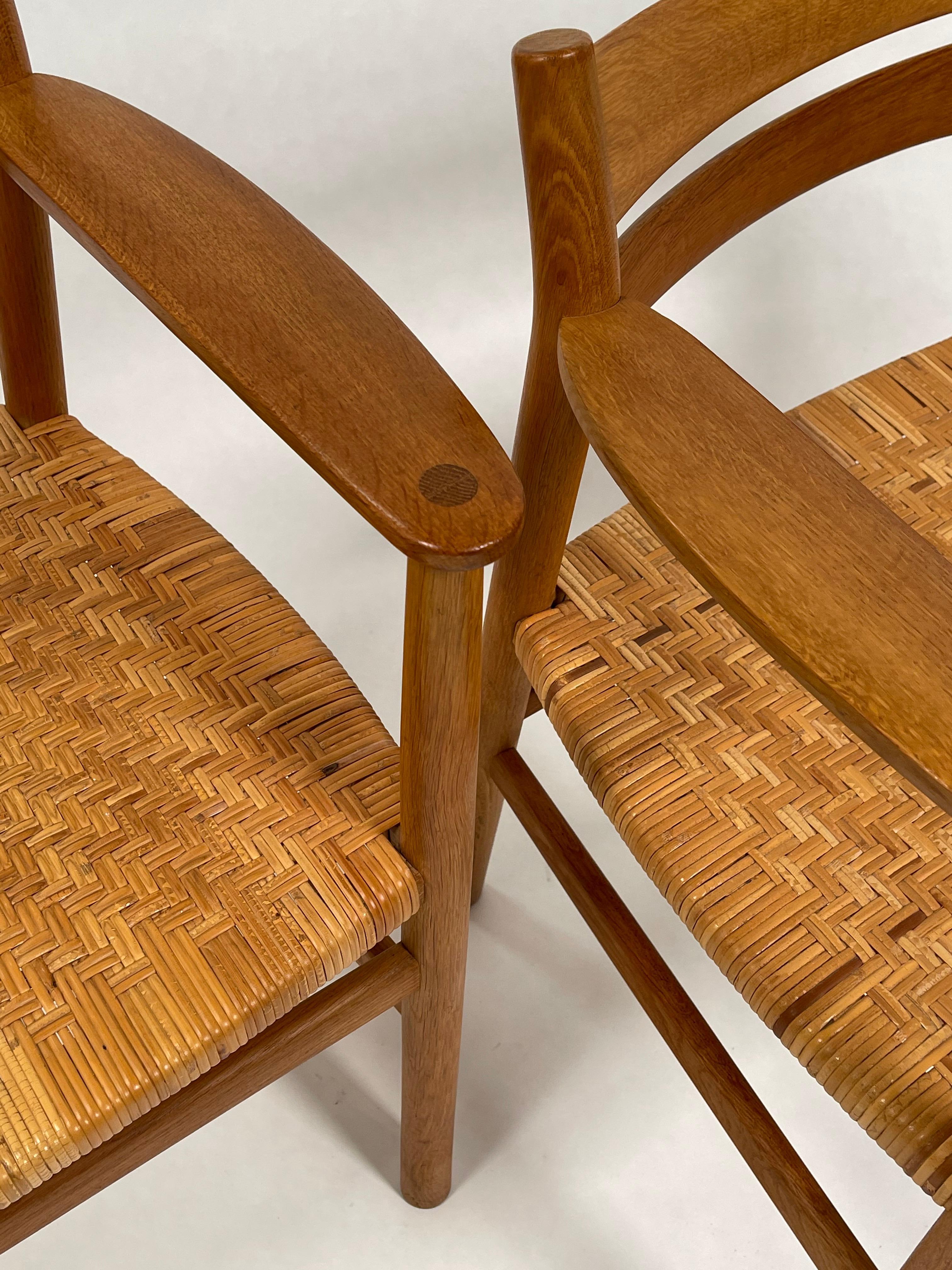 A fantastic pair of Børge Mogensen 'BM1' armchairs in patinated oak and cane. Great original vintage condition.
Executed by C.M.Madsens Fabriker, Haarby, Denmark, in the 1960s.
Provenience: Long time friend of Børge Mogensen.
 