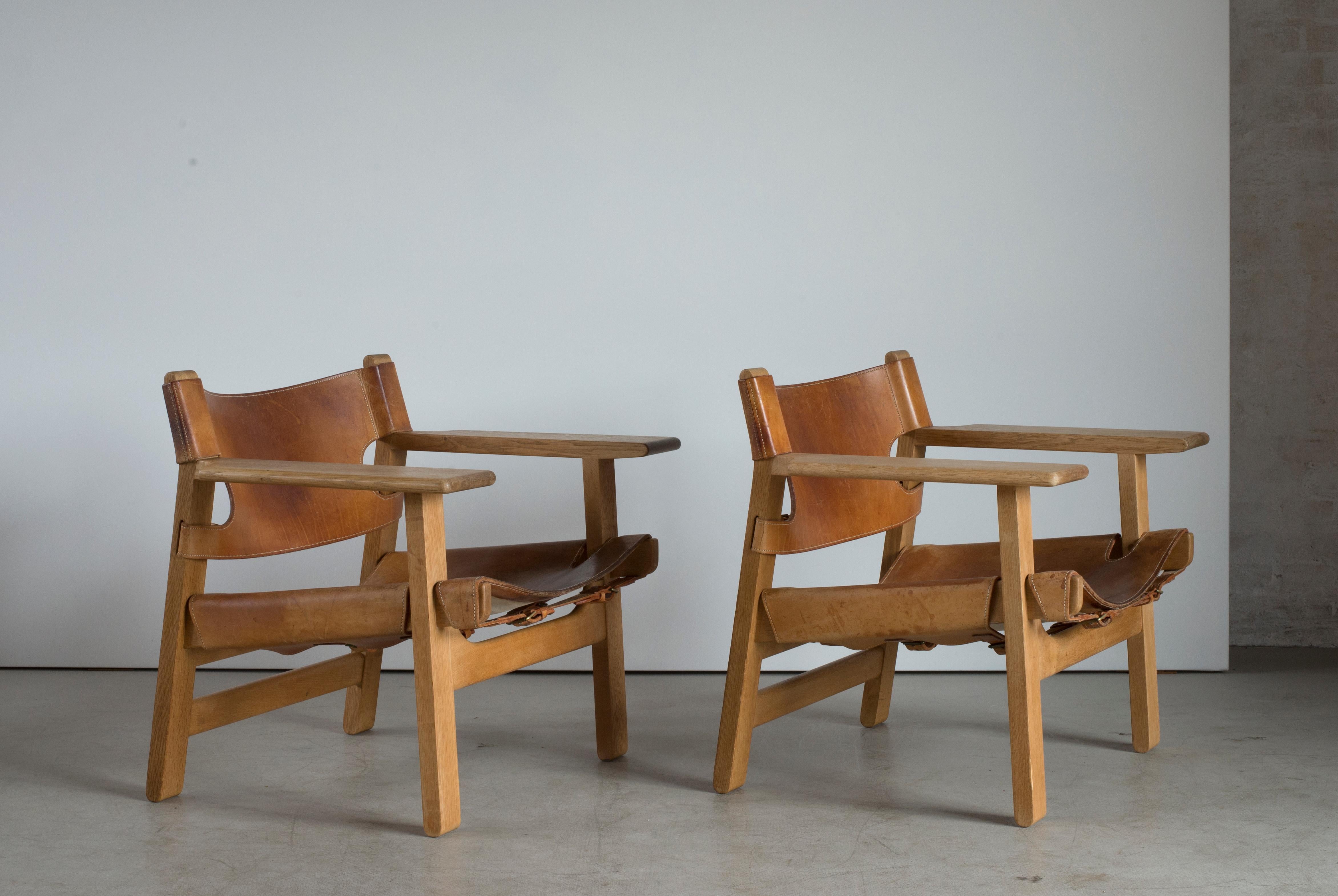 Børge Mogensen pair of Spanish chairs in oak and natural tanned leather. Executed by Fredericia Furniture. Leather by Dahlman, Copenhagen.