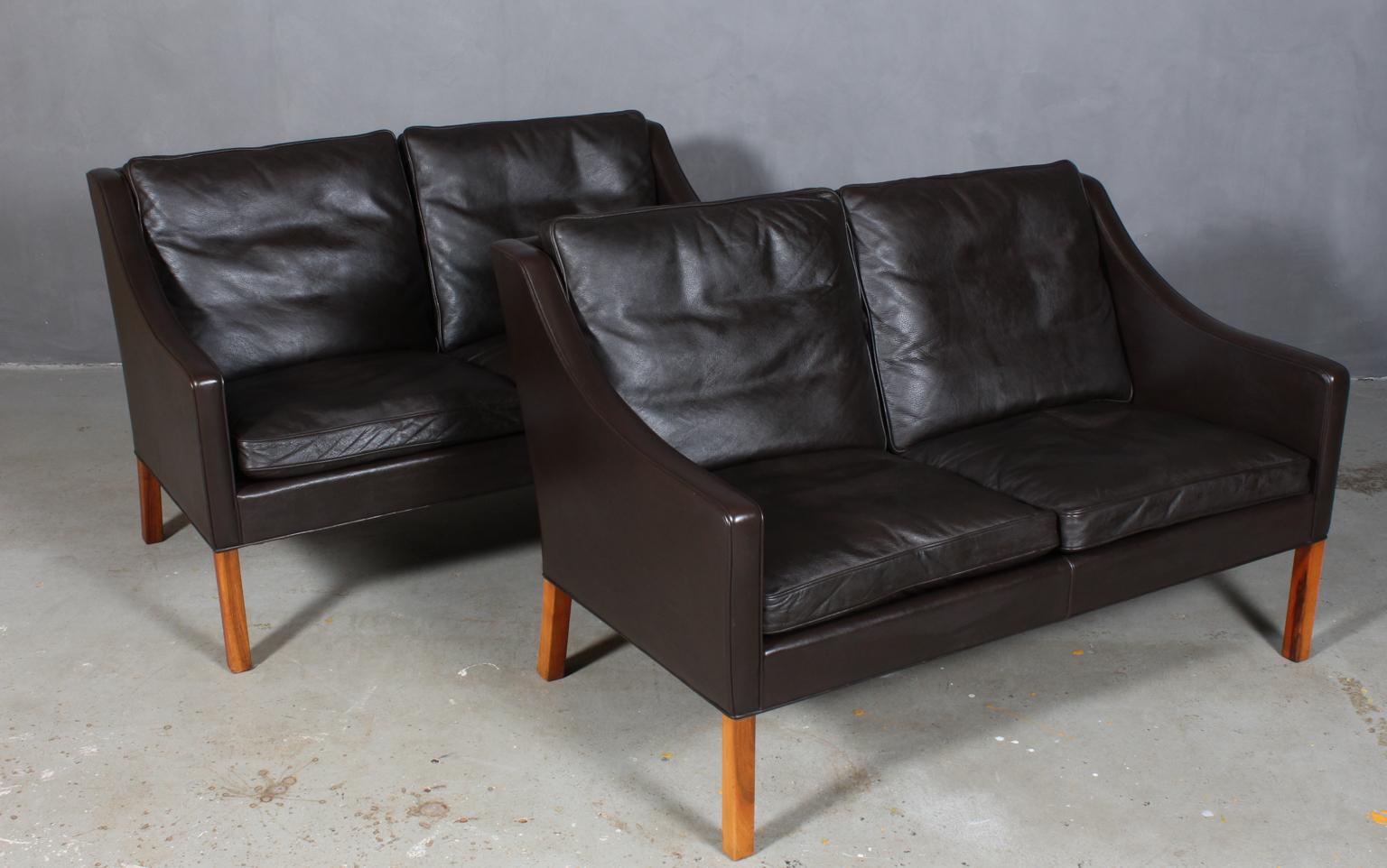 Pair of Børge Mogensen two-seat sofa original upholstered with dark brown leather upholstery.

Legs of mahogany.

Model 2208, made by Fredericia furniture.