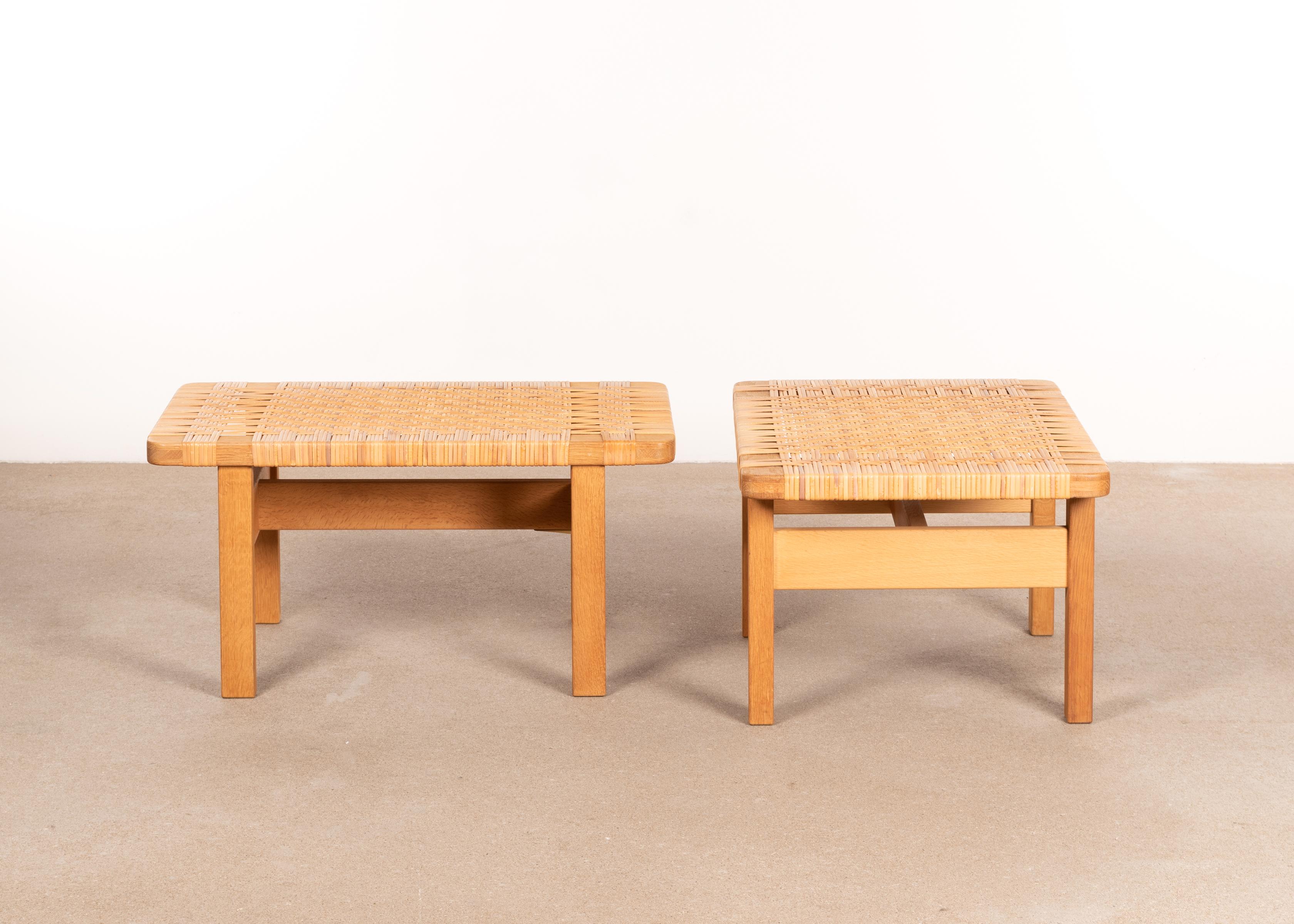 Elegant pair of benches or coffee tables (Model 5273) designed by Børge Mogensen for Fredericia Stølefabrik, Denmark. Solid soaped oak frames with cane all in very good original condition and signed by manufacturer. Very minor staining,