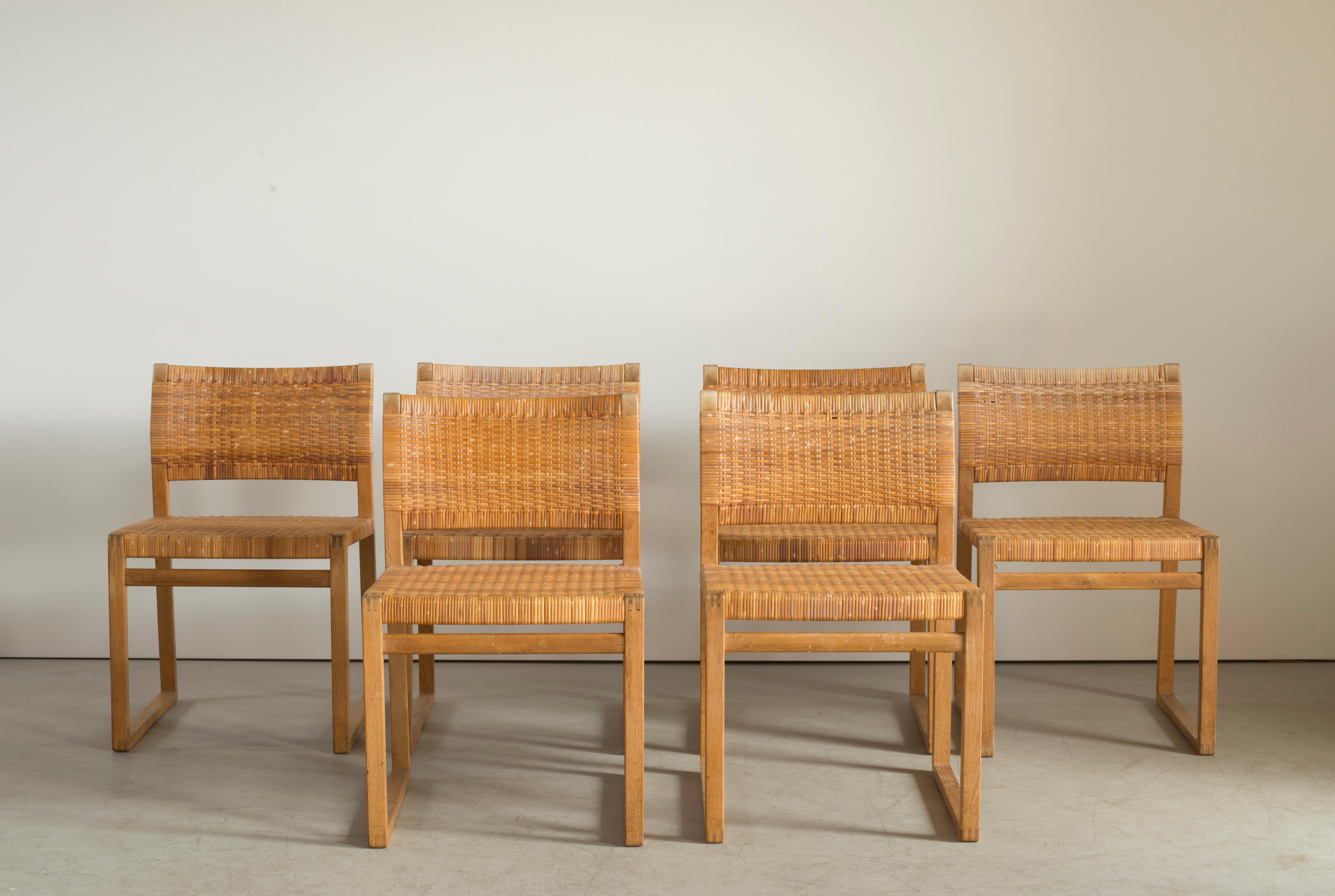 Børge Mogensen set of six chairs of oak and cane. Executed by P. Lauritzen & Son.