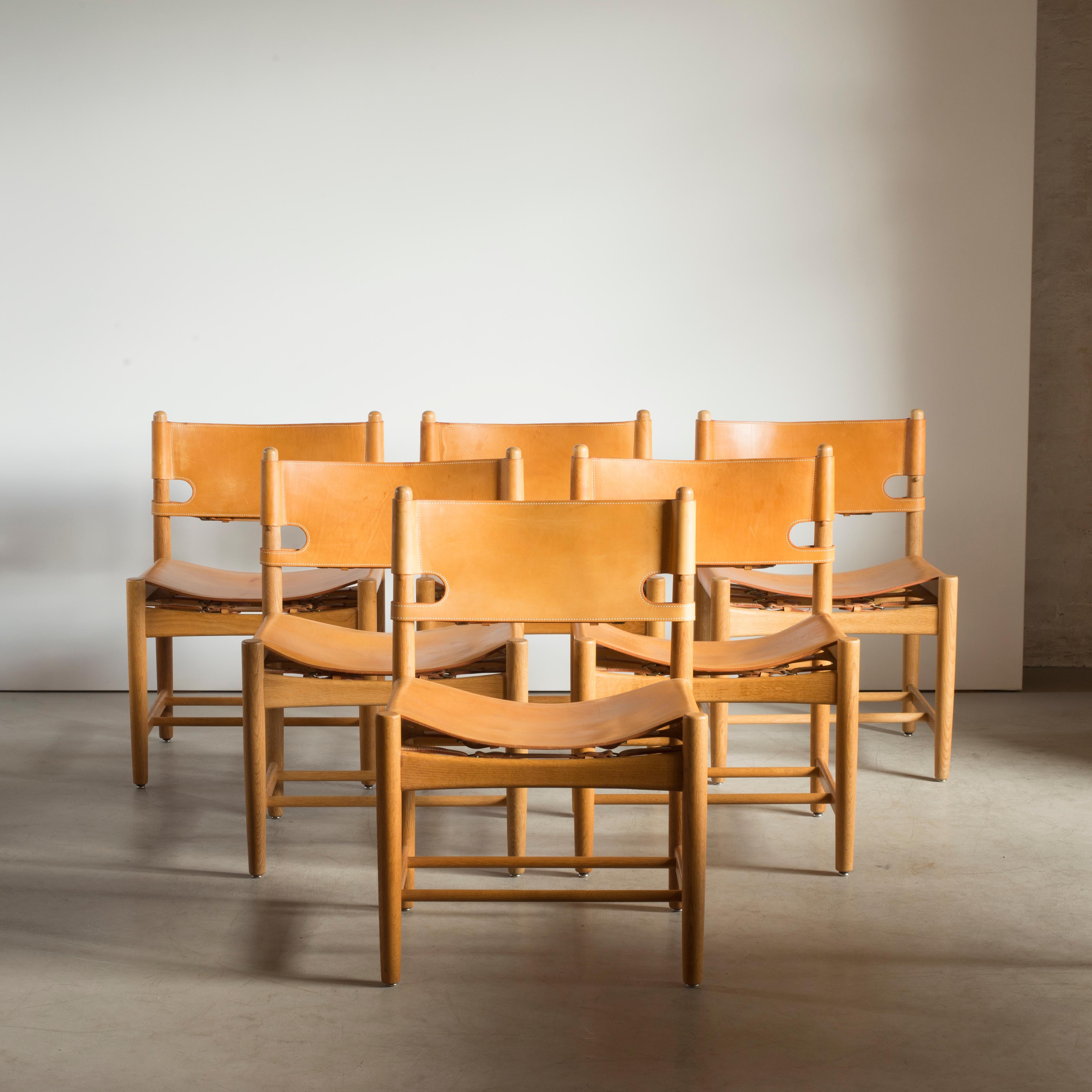 Børge Mogensen set of six dining chairs in oak and natural tanned leather. Executed by Fredericia Furniture.
