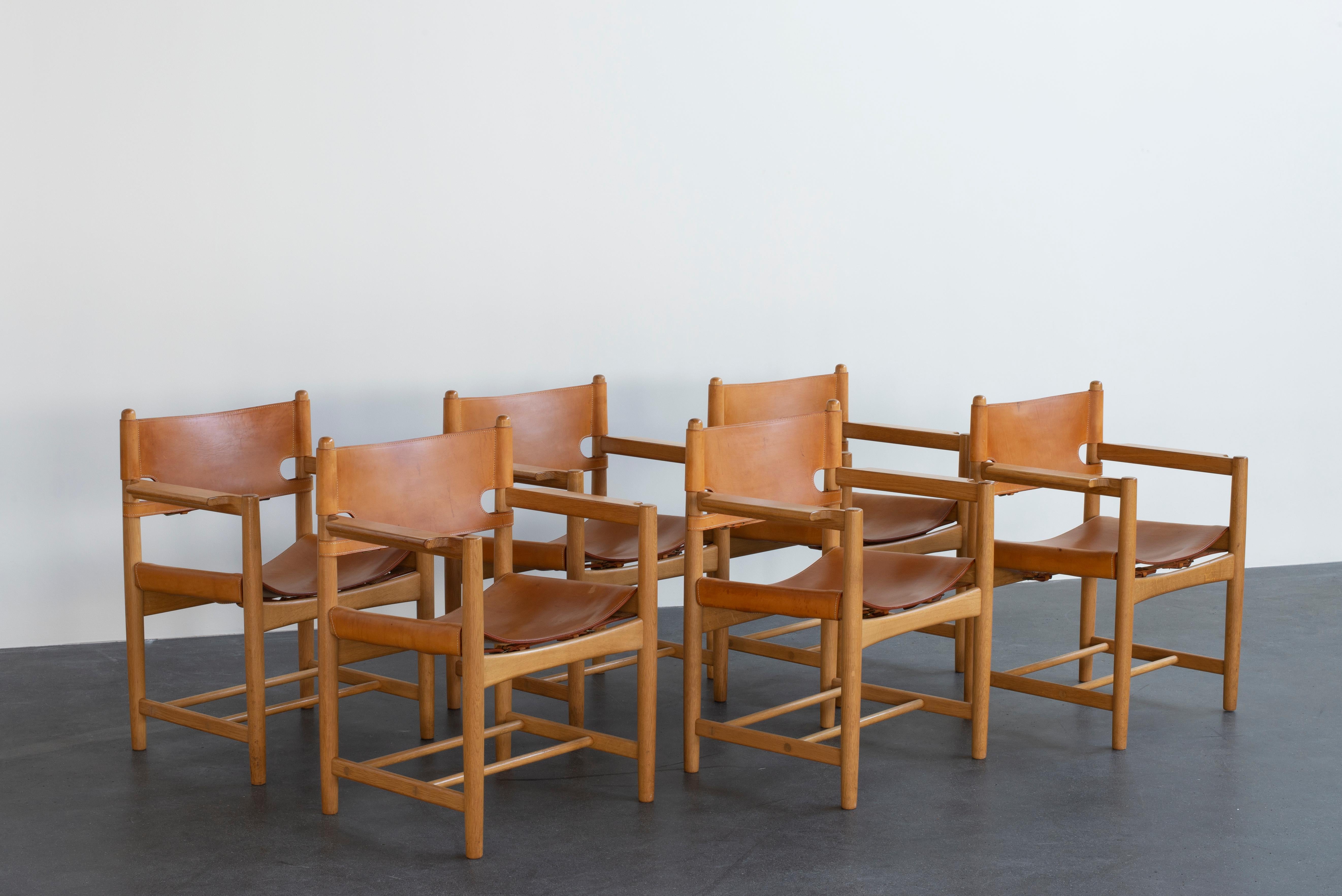 Børge Mogensen set of six chairs of oak and natural tanned leather. Executed by Fredericia Furniture.
