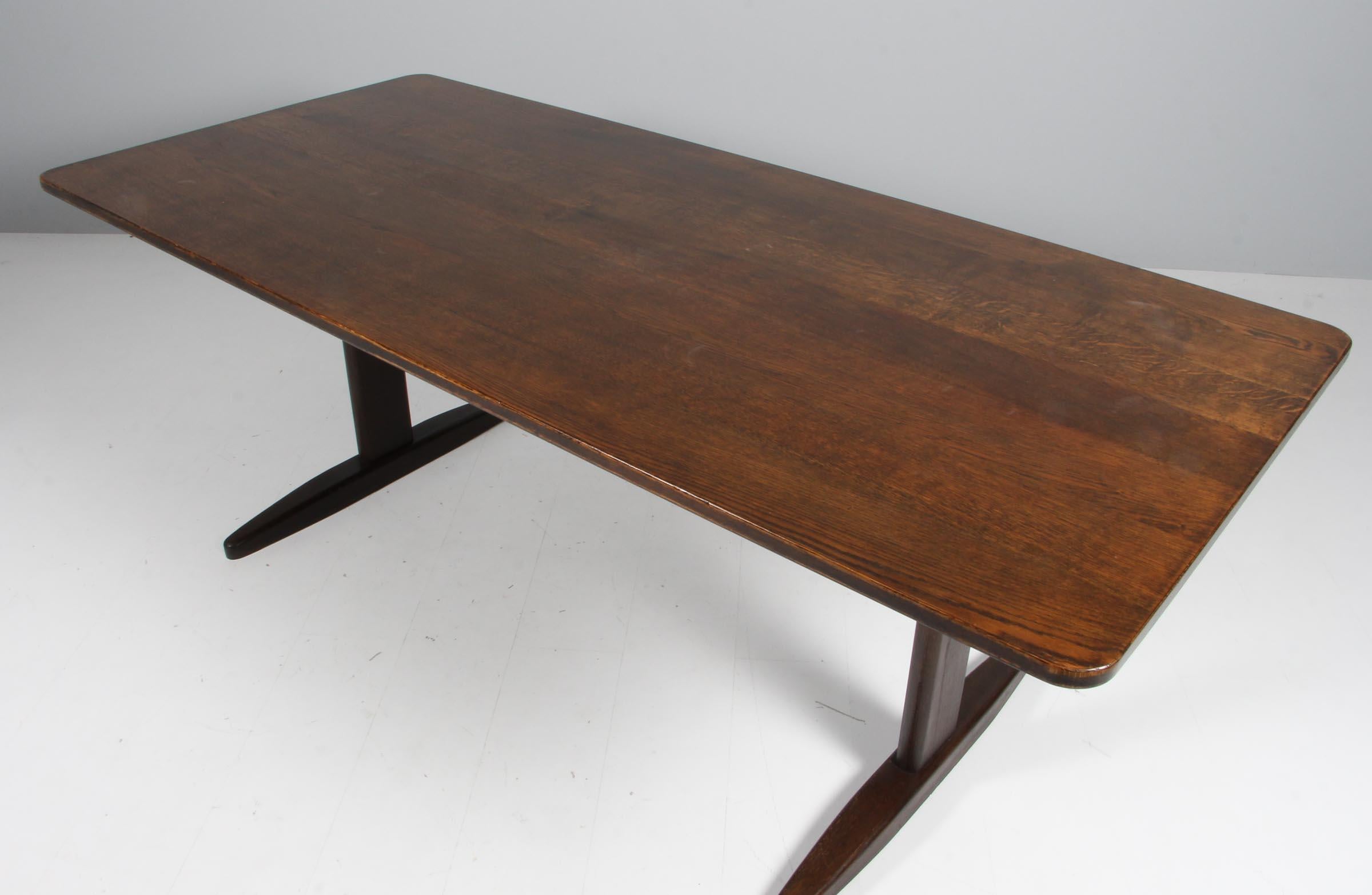 Børge Mogensen shaker dining table in solid smoked oak, extension leafes of smoked beech.

Made by C.M. Madsen.