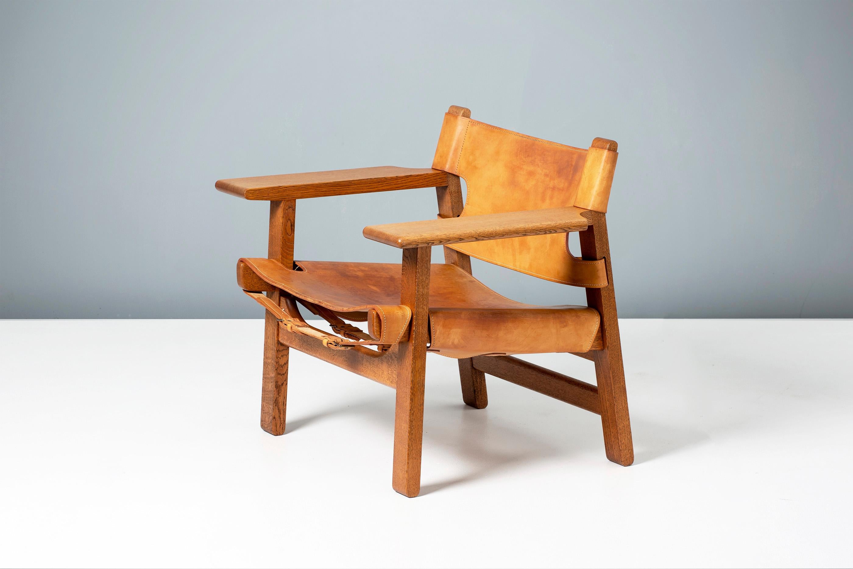 Børge Mogensen

The Spanish Chair, circa 1958

Manufactured by Fredericia Stolefabrik, Copenhagen, Denmark. Solid oak frame with original, patinated tan saddle leather seat and back and brass fittings. This example produced in the 1960s. 

In