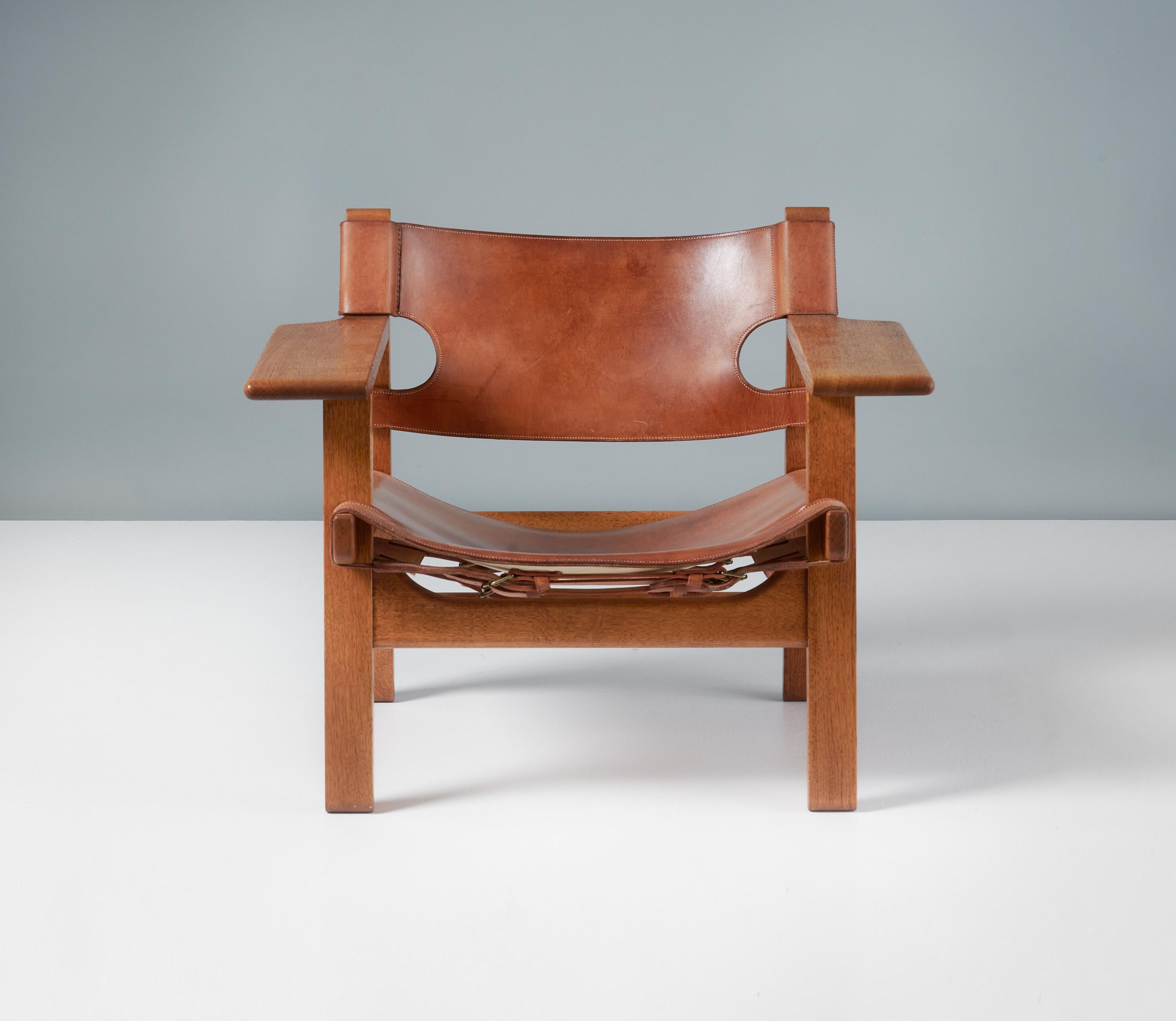 Børge Mogensen - The Spanish Chair, c1958

Manufactured by Fredericia Stolefabrik, Copenhagen, Denmark. Beautifully patinated and aged oak frame with original, patinated tan saddle leather seat and back and brass fittings. This wonderful early