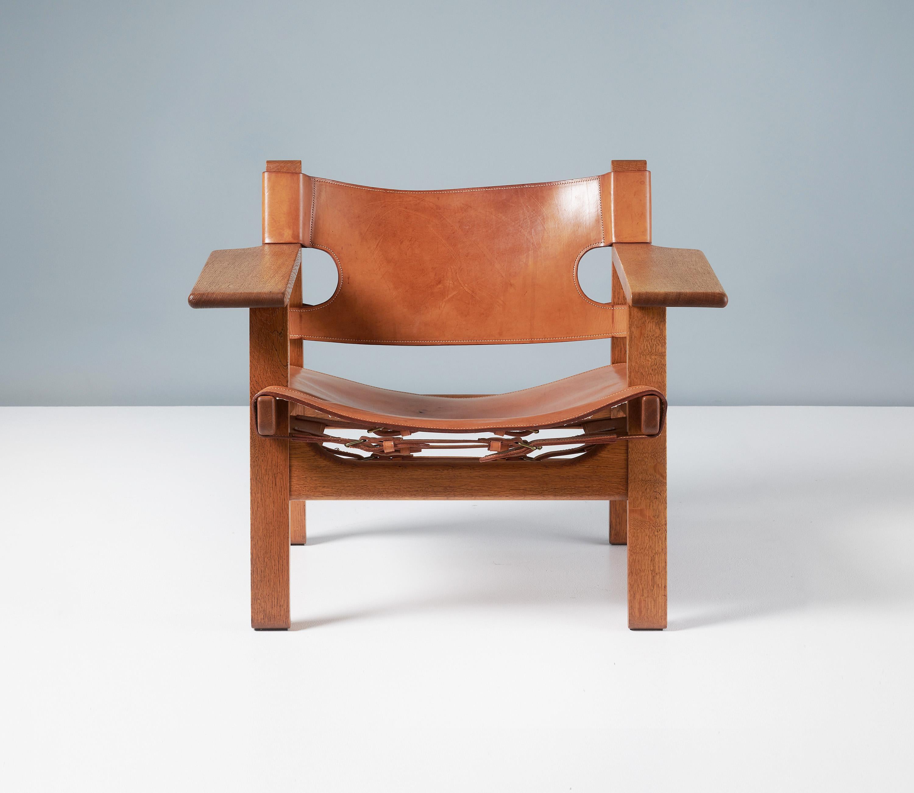 Børge Mogensen - The Spanish Chair, c1958

Manufactured by Fredericia Stolefabrik, Copenhagen, Denmark. Beautifully patinated and aged oak frame with original, patinated tan saddle leather seat and back and brass fittings. This wonderful early