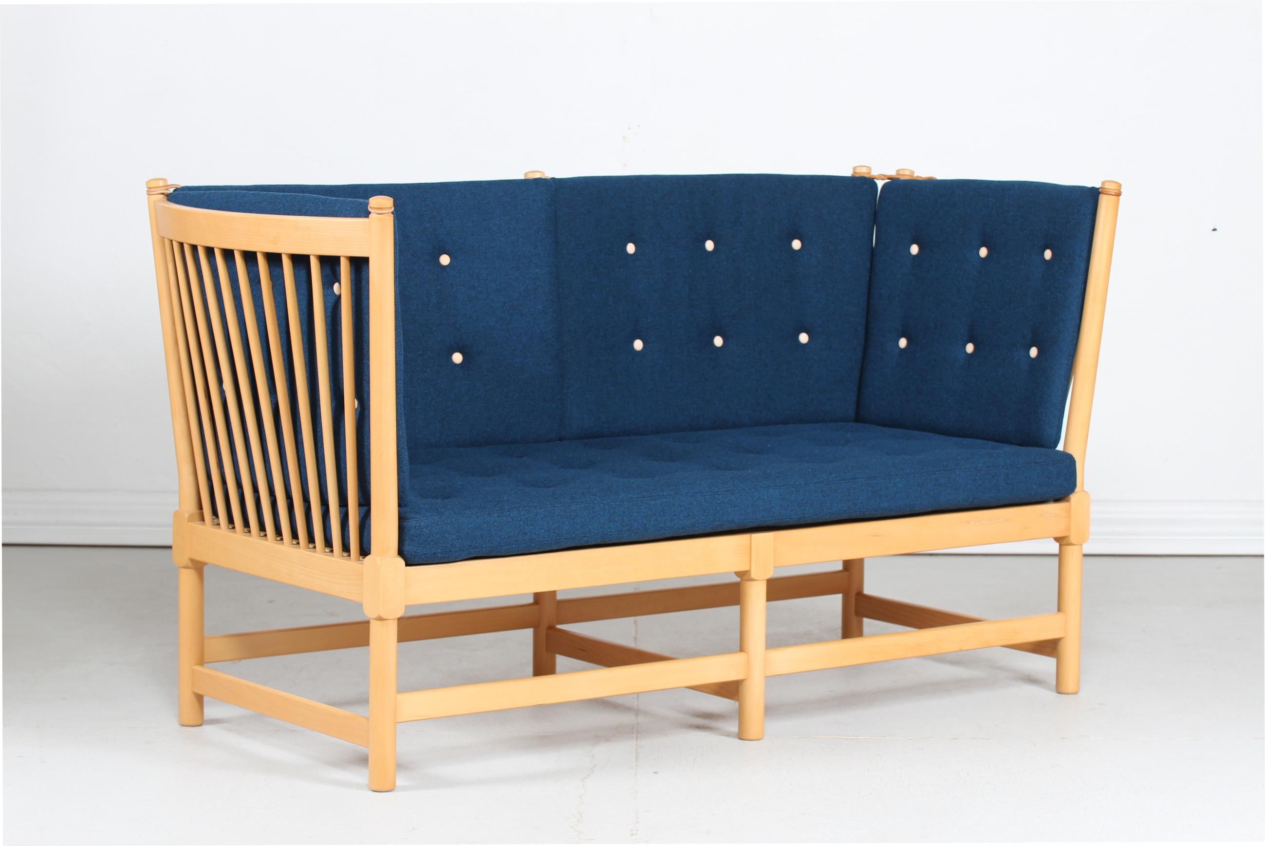 Danish vintage Børge Mogensen spoke back sofa model 1789 made of solid beech with lacquer and reupholstered with new cushions in the fabric Tonica 2 0773 from the Danish textile design company Kvadrat.

The sofa is manufactured by Fritz Hansen A/S