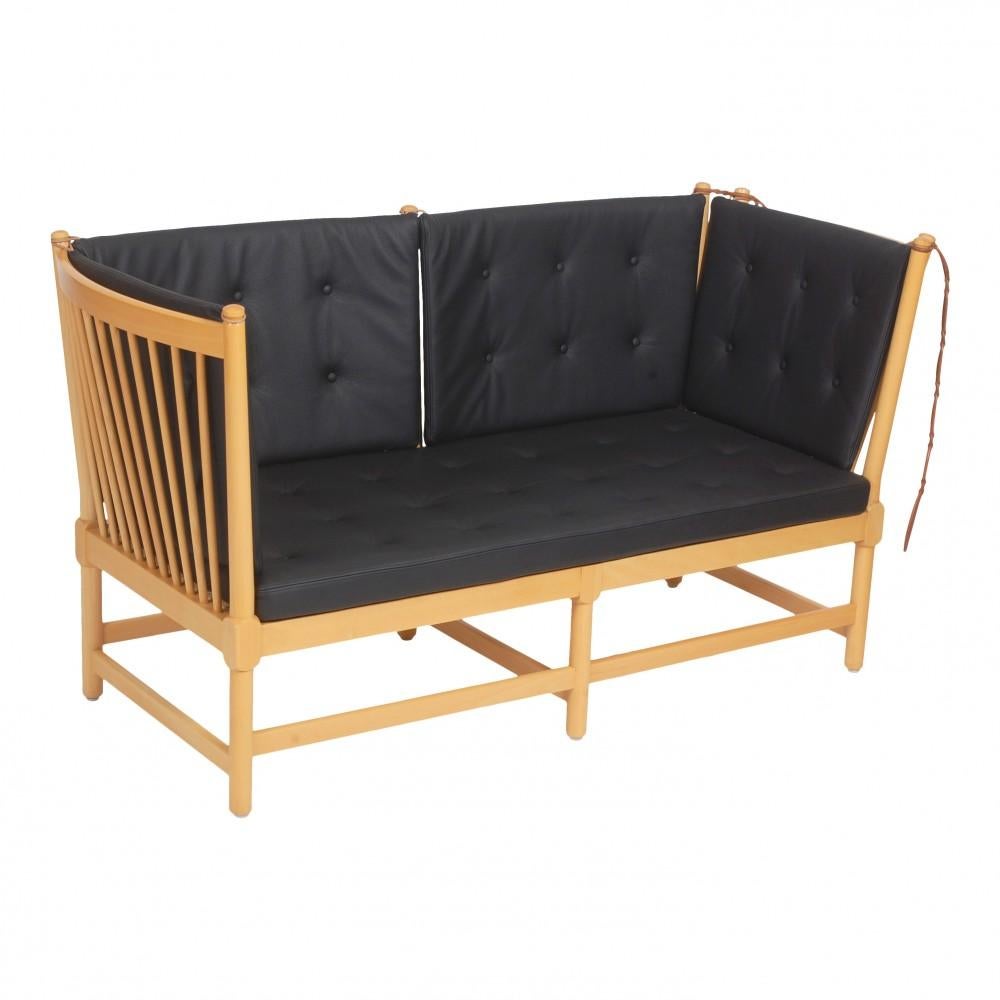 Børge Mogensen Spoke-back sofa with a frame of beech, and new foam cushions upholstered with black bizon leather. The sofa appears in good condition, but the frame might have some minor signs of use.