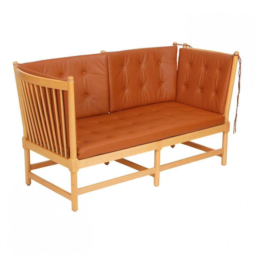 Børge Mogensen Spoke-back sofa with a frame of beech, and new foam cushions upholstered with cognac bizon leather. The sofa appears in good condition, but the frame might have some minor signs of use.