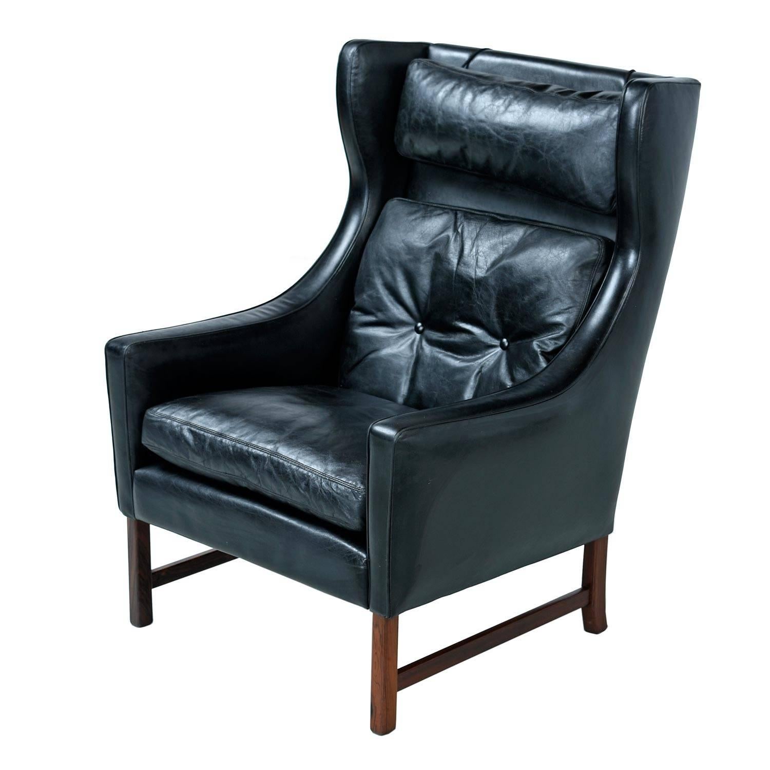 Mid-Century Modern Fredrik Kayser Black Leather and Rosewood Wingback Lounge Chair and Ottoman