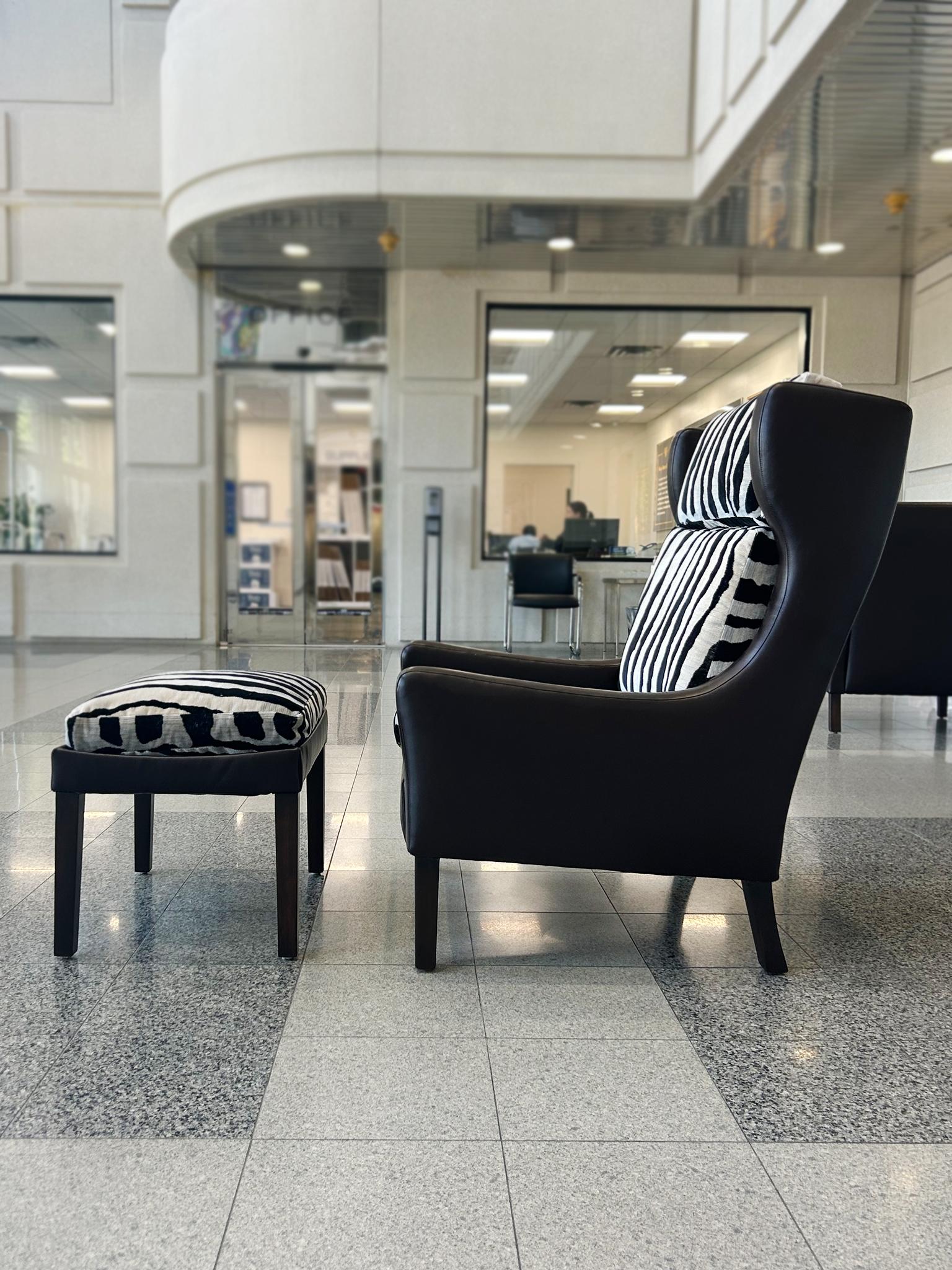 Mid-20th Century Børge Mogensen Style Leather Wingback & Ottoman For Sale