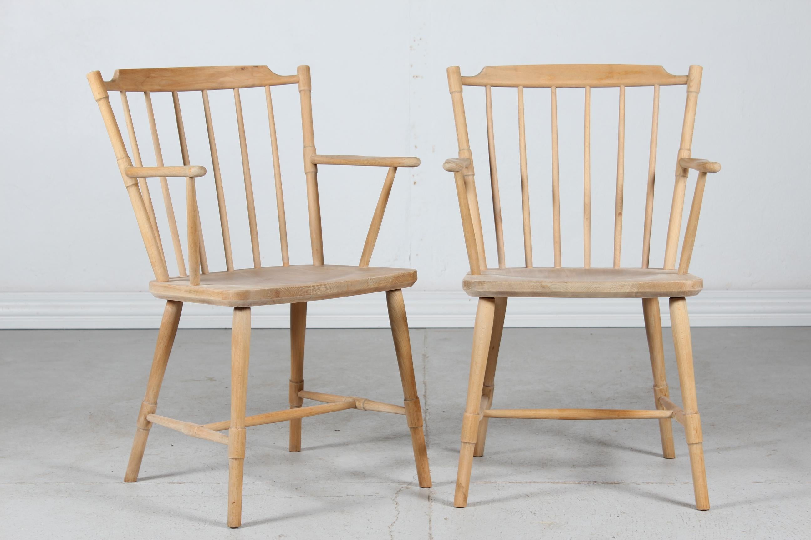 Here is pair of Danish modern Windsor armchairs in the style of Børge Mogensen.
The chairs are made of beech with soap treatment.

They are made in the 1970´s by a Danish Furniture Manufacturer, probably by FDB Møbler in Danmark.

Nice vintage