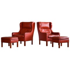 Børge Mogensen Style Pair of Wingback Lounge Chairs and Ottomans in Red Leather