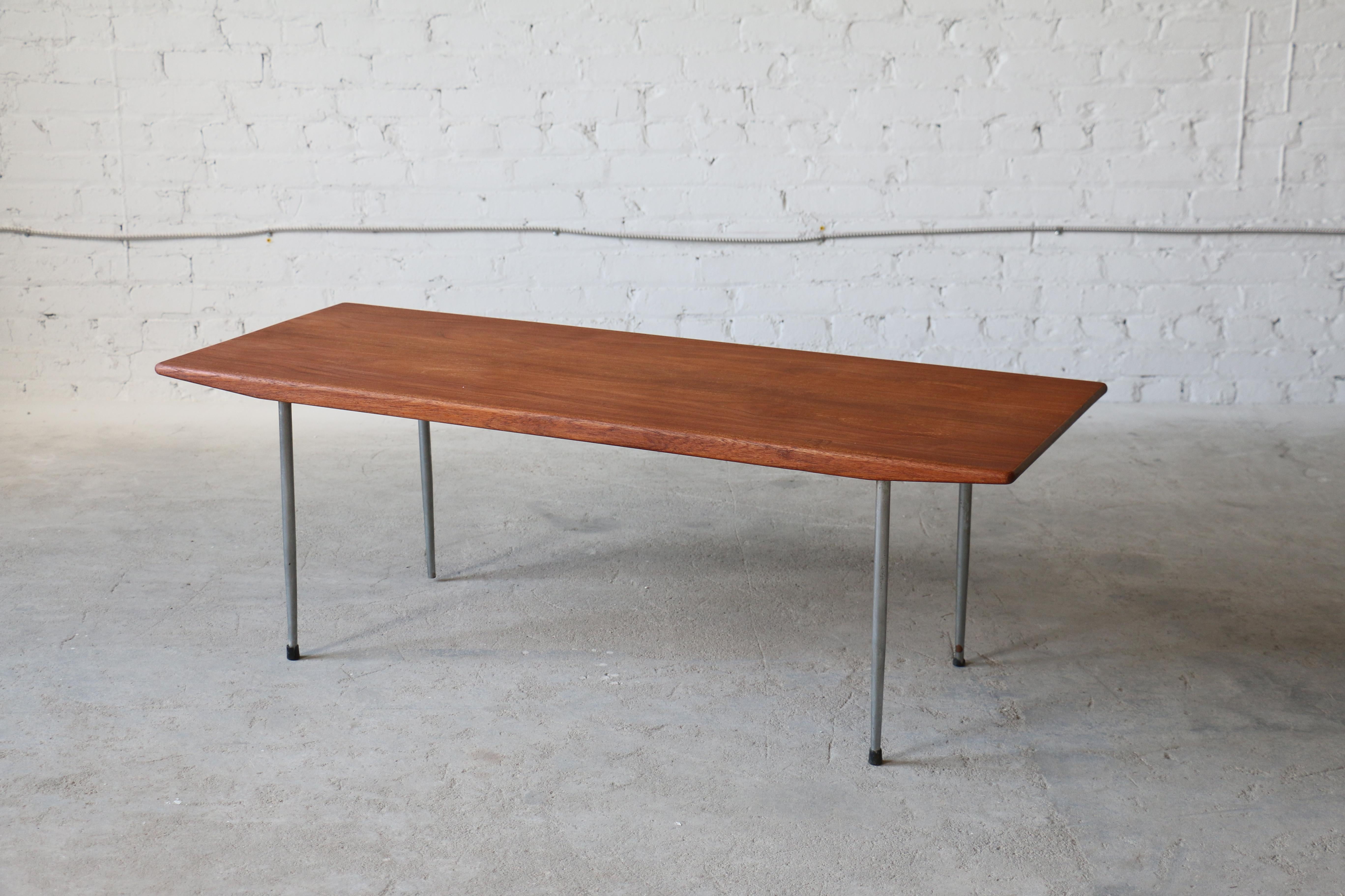 A very rare teak coffee table designed by Børge Mogensen for Tage Kristensen. This table was one of the first pieces Mogensen designed with the use of metal as an element. This table matched an easy chair design for Tage Kristensen as well as a