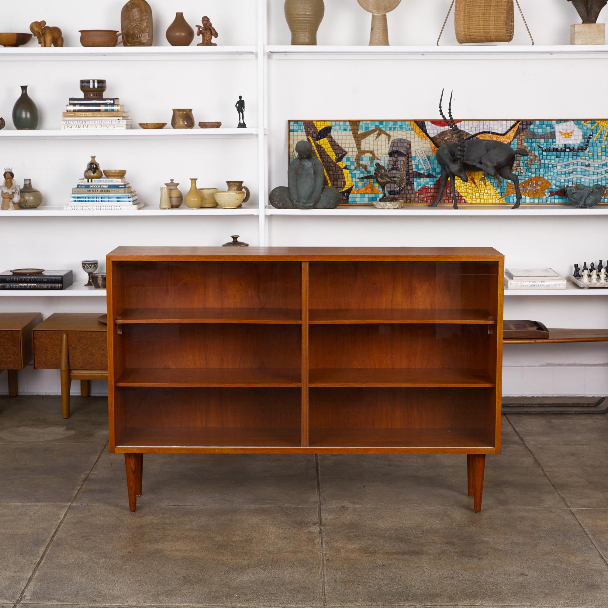 teak bookcase with glass doors