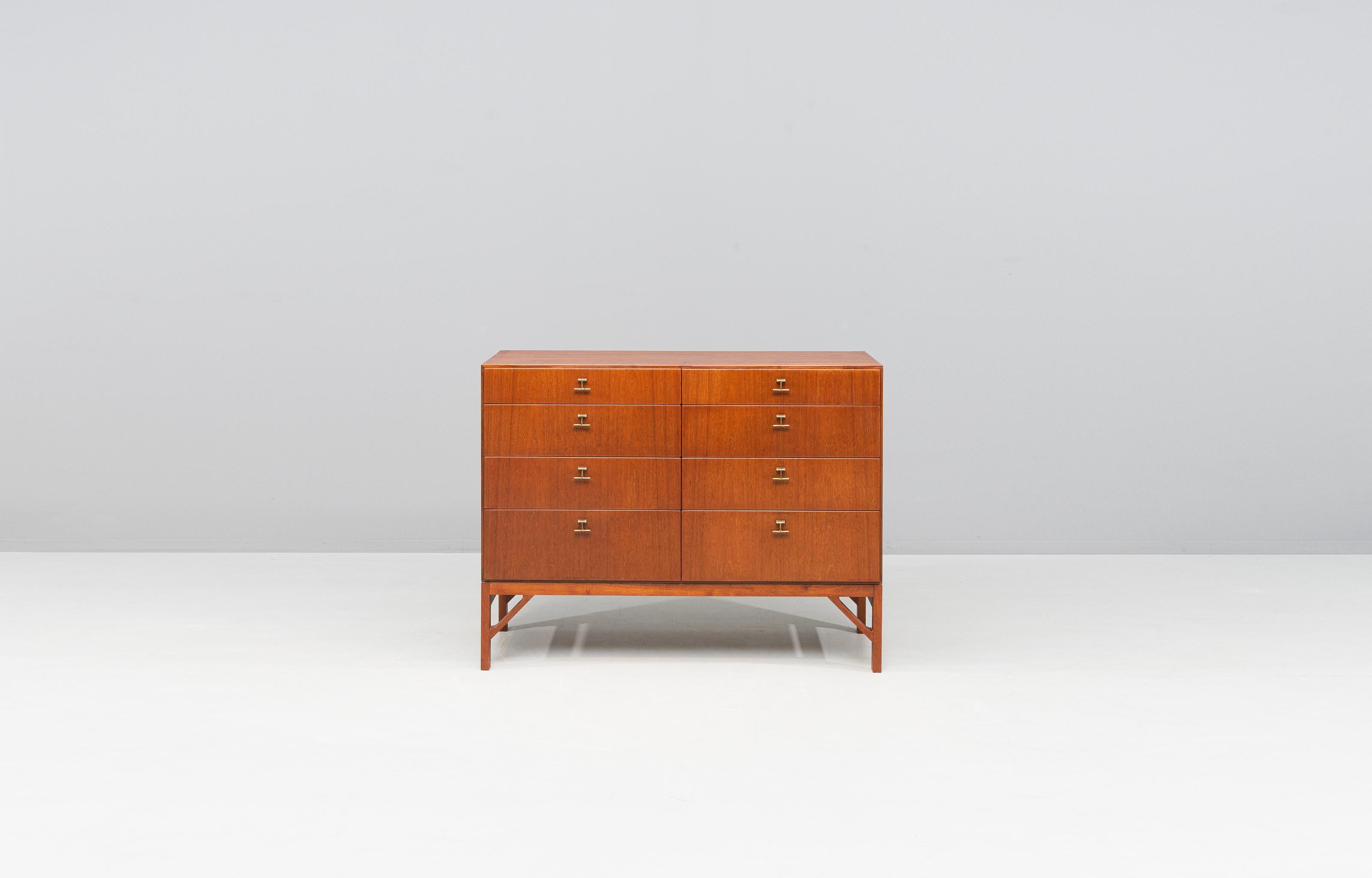Beautiful teak cabinet with eight drawers and brass handles. Designed by Børge Mogensen in the 1960s, produced by FDB Møbler. Model 234, stamped by FDB on the backside.

Light wear consistent with age and use.