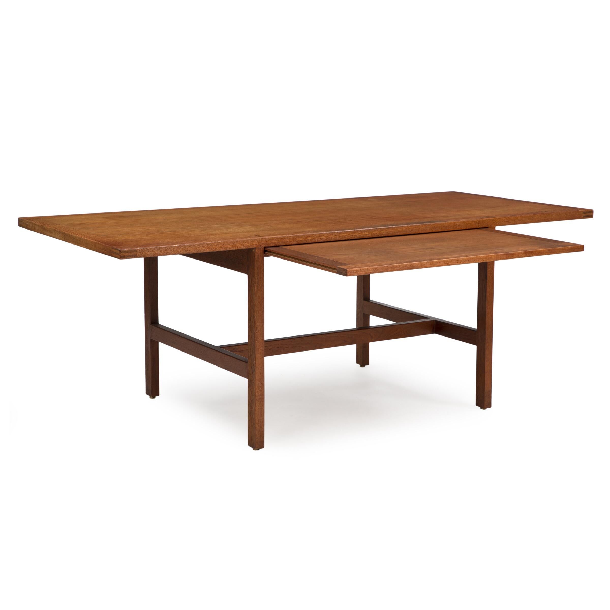 Desk of teak, including module with three drawers and extension leaf.
Dimensions: 75