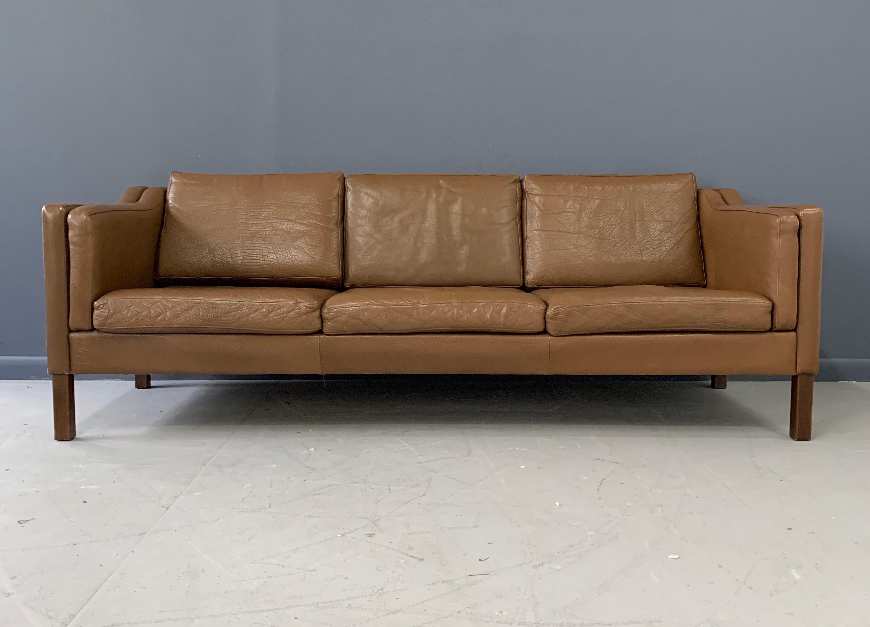 Børge Mogensen three-seat sofa with original brown leather upholstery. Legs of walnut Model 2213, made by Fredericia Furniture.