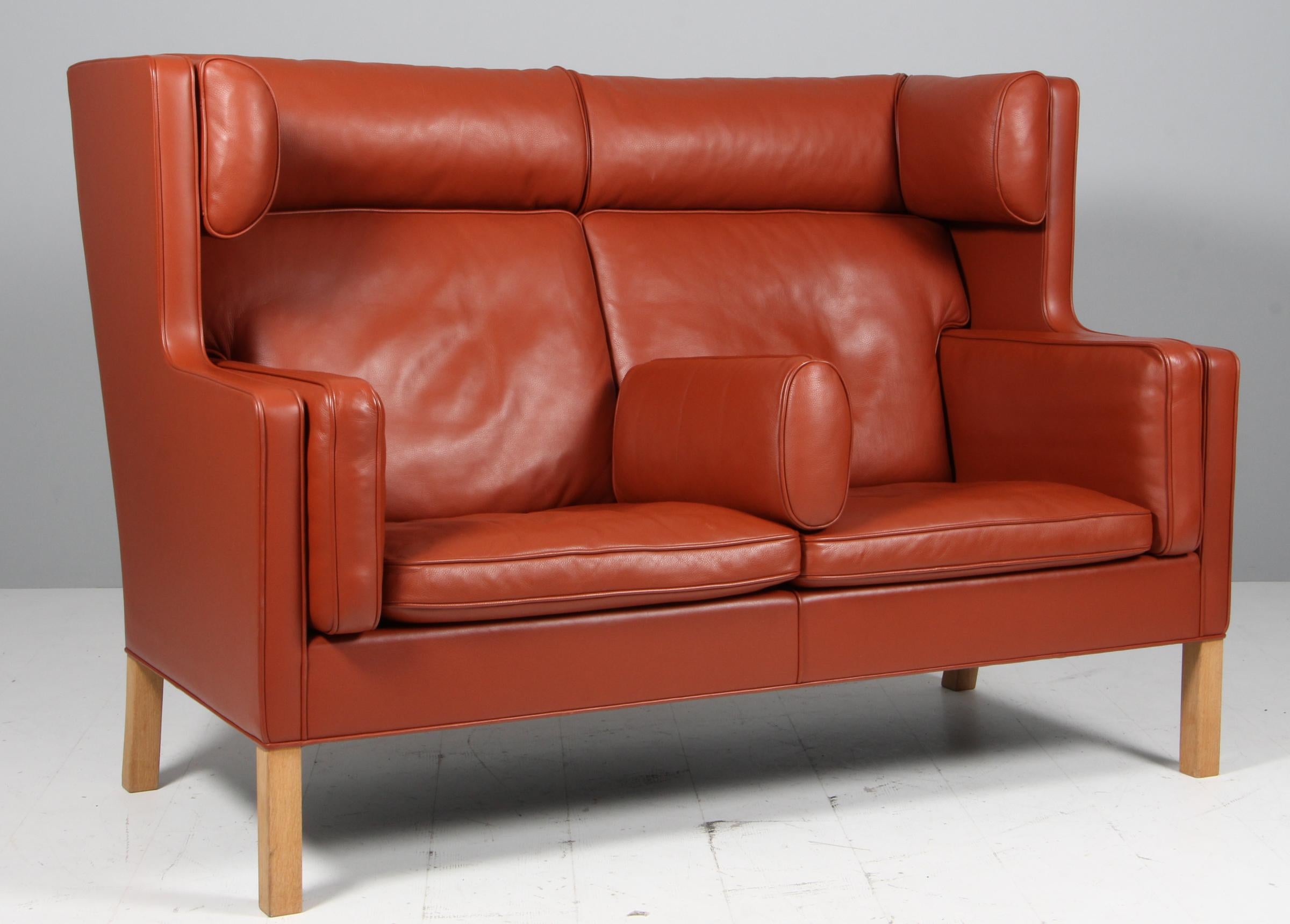 Børge Mogensen original upholstered kupe sofa with cognac leather.

Legs of oak.

Model 2292, made by Fredericia Furniture.


