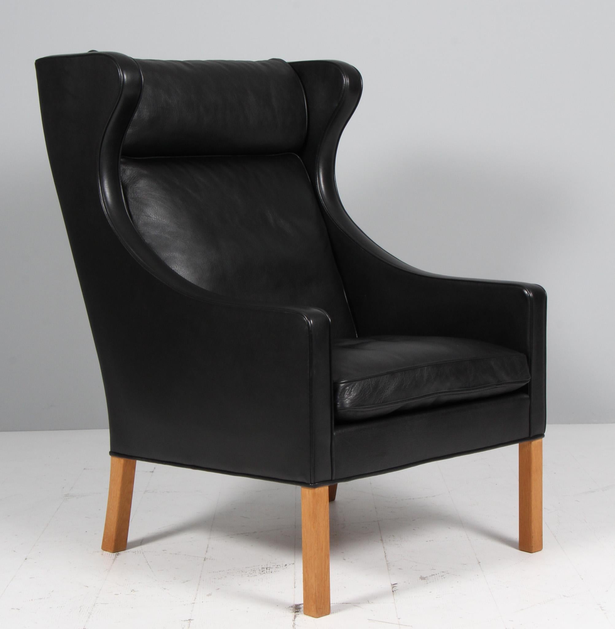 Oak Børge Mogensen Wingback Chair and Ottoman, Model 2202 / 2204, leather For Sale