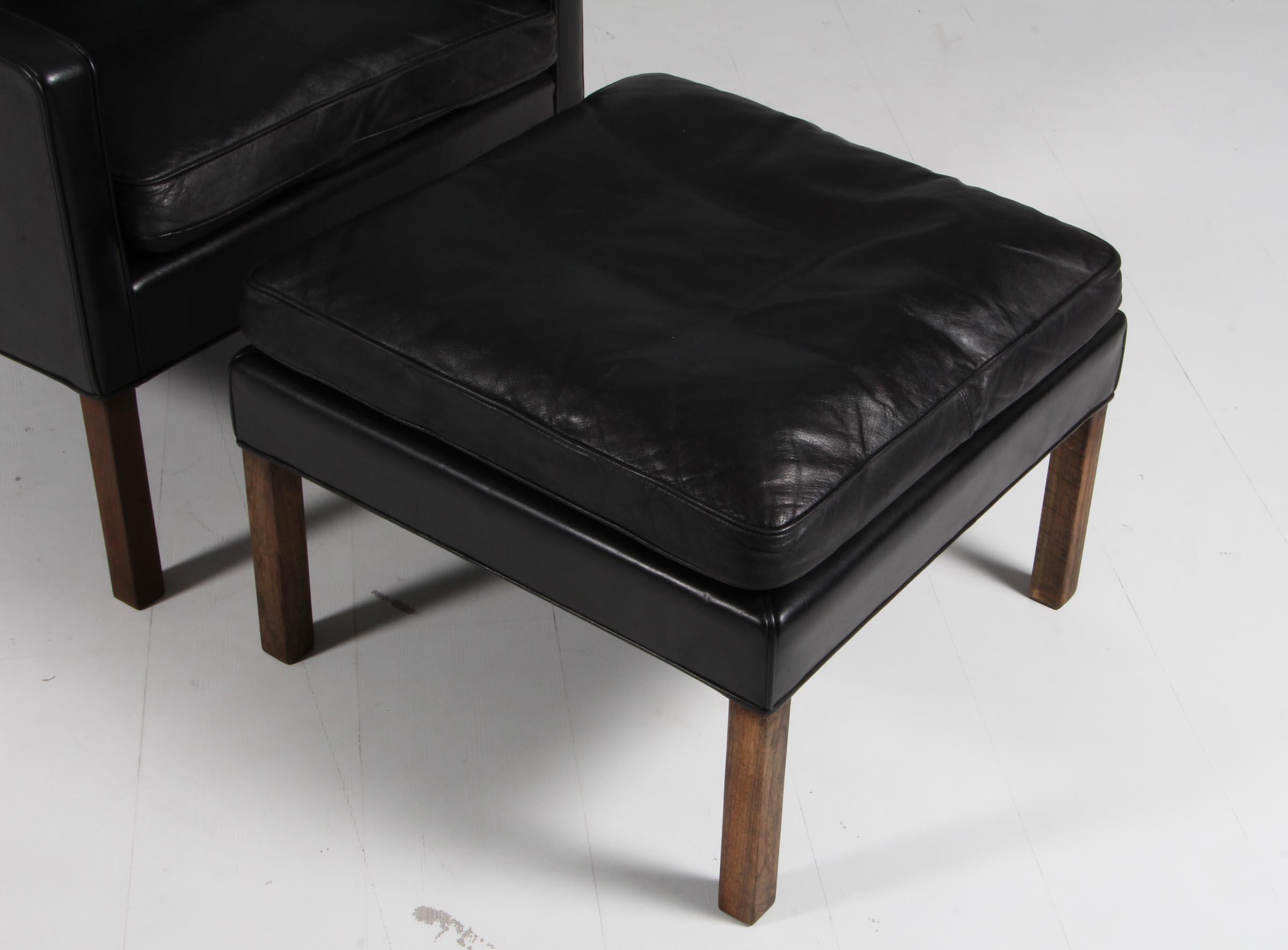 Scandinavian Modern Børge Mogensen Wingback Chair and Ottoman, Model 2202 / 2204, Original Leather For Sale