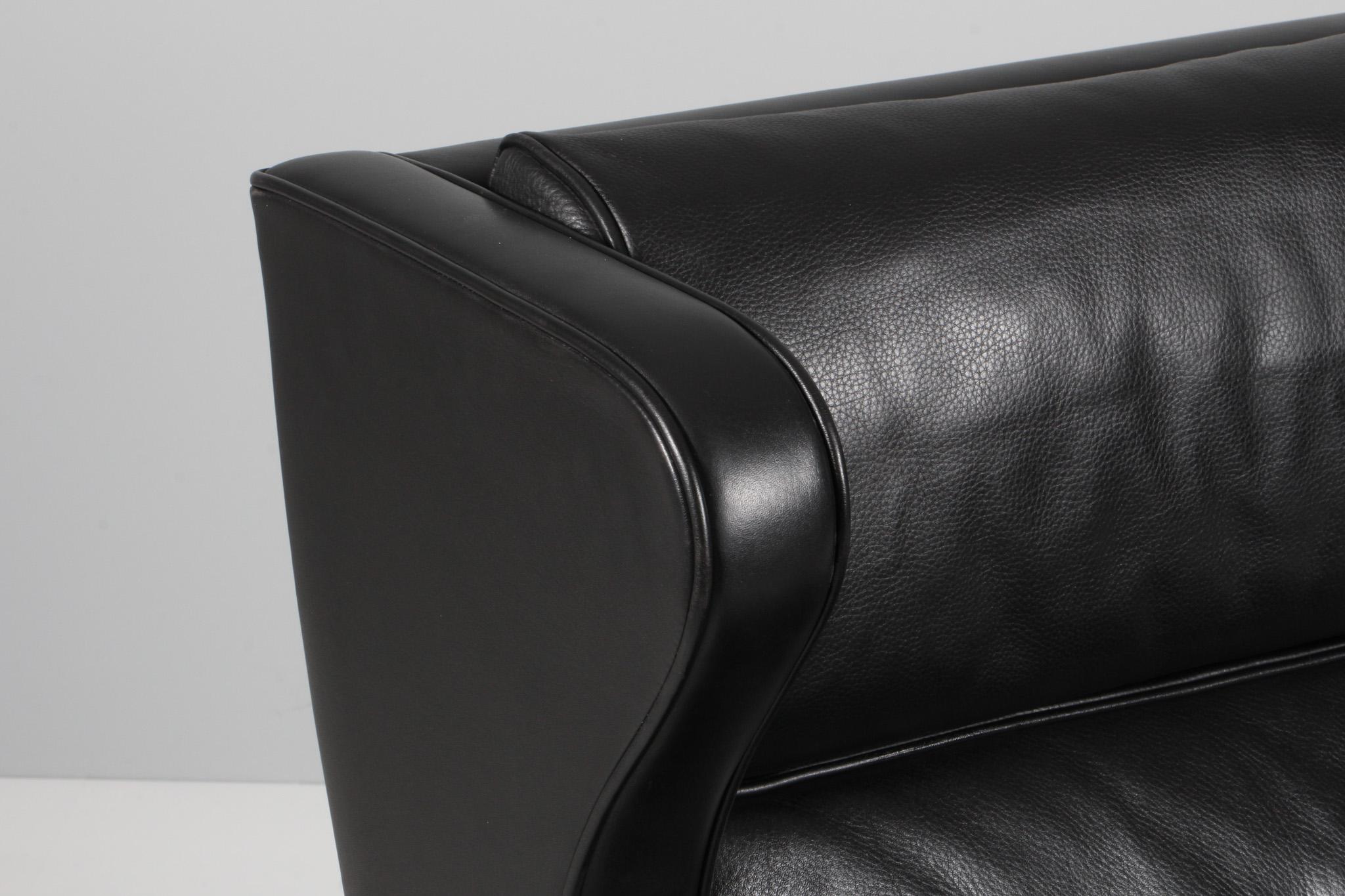 Danese Sedia Wingback di Børge Mogensen, modello 2204. Pelle originale