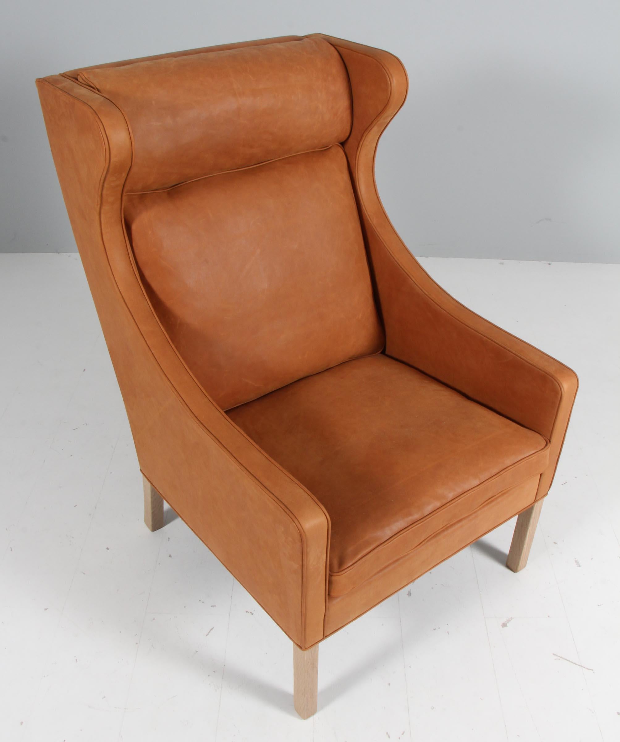 Silla Børge Mogensen con respaldo y otomana, piel Dunes Sørensen mediados del siglo XX en venta