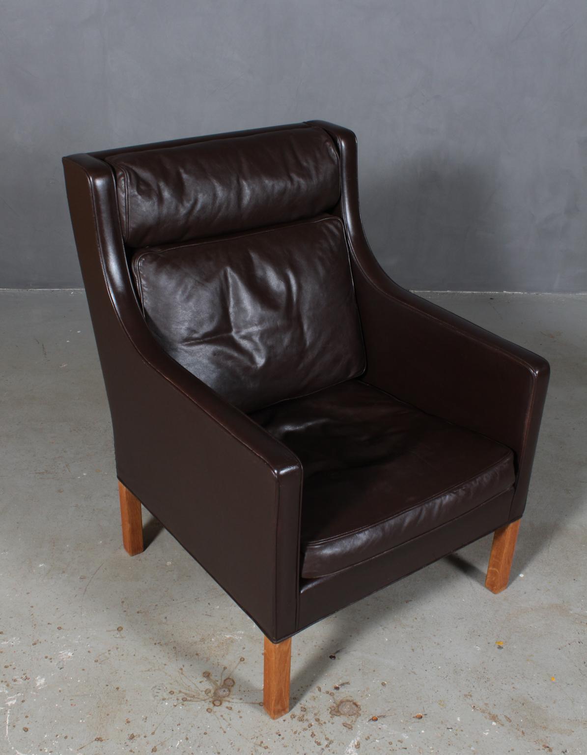 Børge & Peter Mogensen lounge chair in original brown leather upholstery. 

Legs in oak.

Model 2431, made by Fredericia furniture.

This is a cooperation between Børge Mogensen and his son Peter Mogensen.