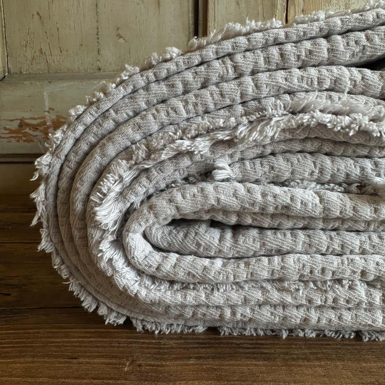 Beautiful cotton coverlet in a muted or deep hue will add a luxurious softness to your bed. Available in bed sizes and throws.
These are our favorite new coverlets due to their softness. 
Made in France.

Care: Unfold your product before washing.