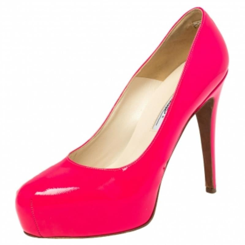 Pretty in pink, these pumps from Brian Atwood are a dream you can add to your collection! Crafted from patent leather, they feature almond toes and come endowed with comfortable leather-lined insoles. They stand tall on 12.5 cm heels supported by
