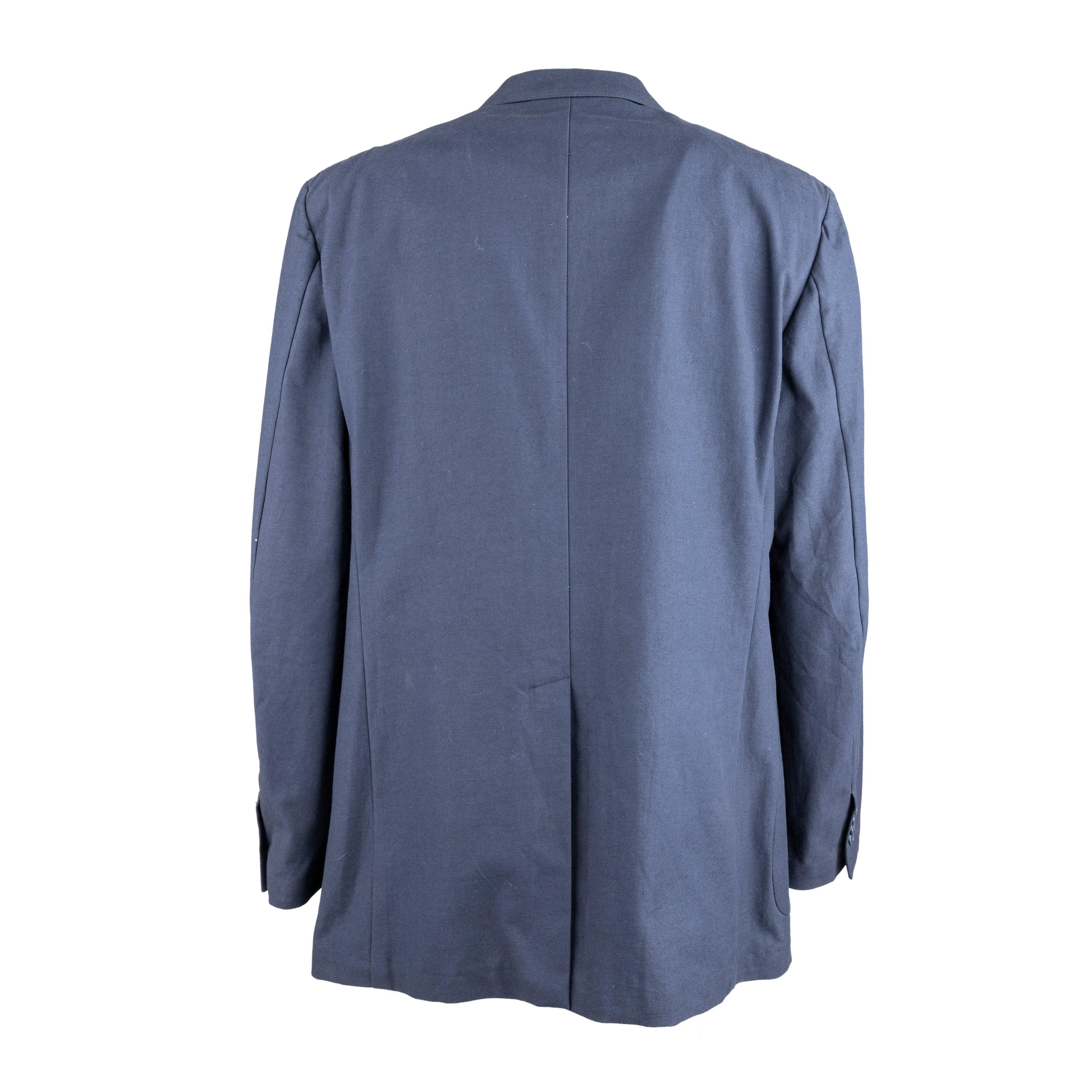 This Brian Dales Cotton Blazer is made from high-quality blue cotton, offering both style and comfort. With its unlined design, you can stay comfortable while looking your best. The notched lapel collar and front buttons add a touch of classic