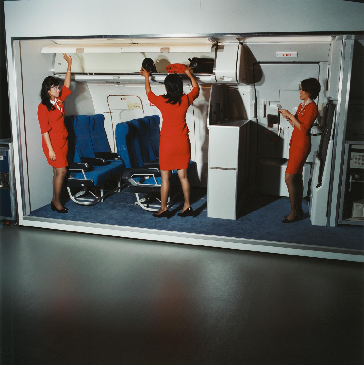 Brian Finke Color Photograph - Untitled (Azriza, Lily, and Stella, Air Asia)