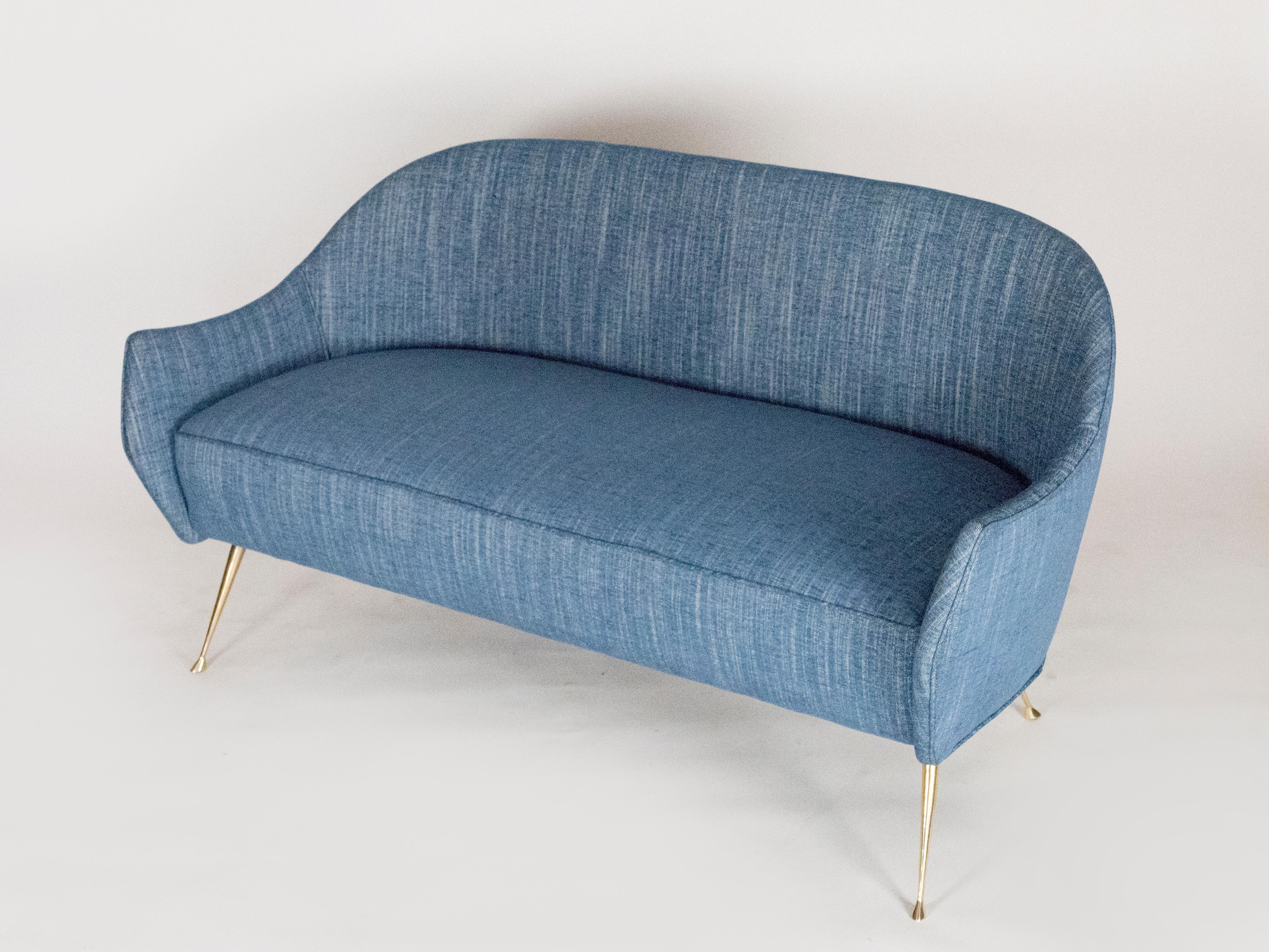 This elegant love seat is the companion piece of our popular Briance chair. It has five cast brass legs and a distinctive curved back. The beauty of the tapered brass legs with their graceful feet are sure to add that sophisticated touch to the