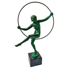BRIAND, Edición Le Verrier, Bailarina con aro, escultura de hierro fundido
