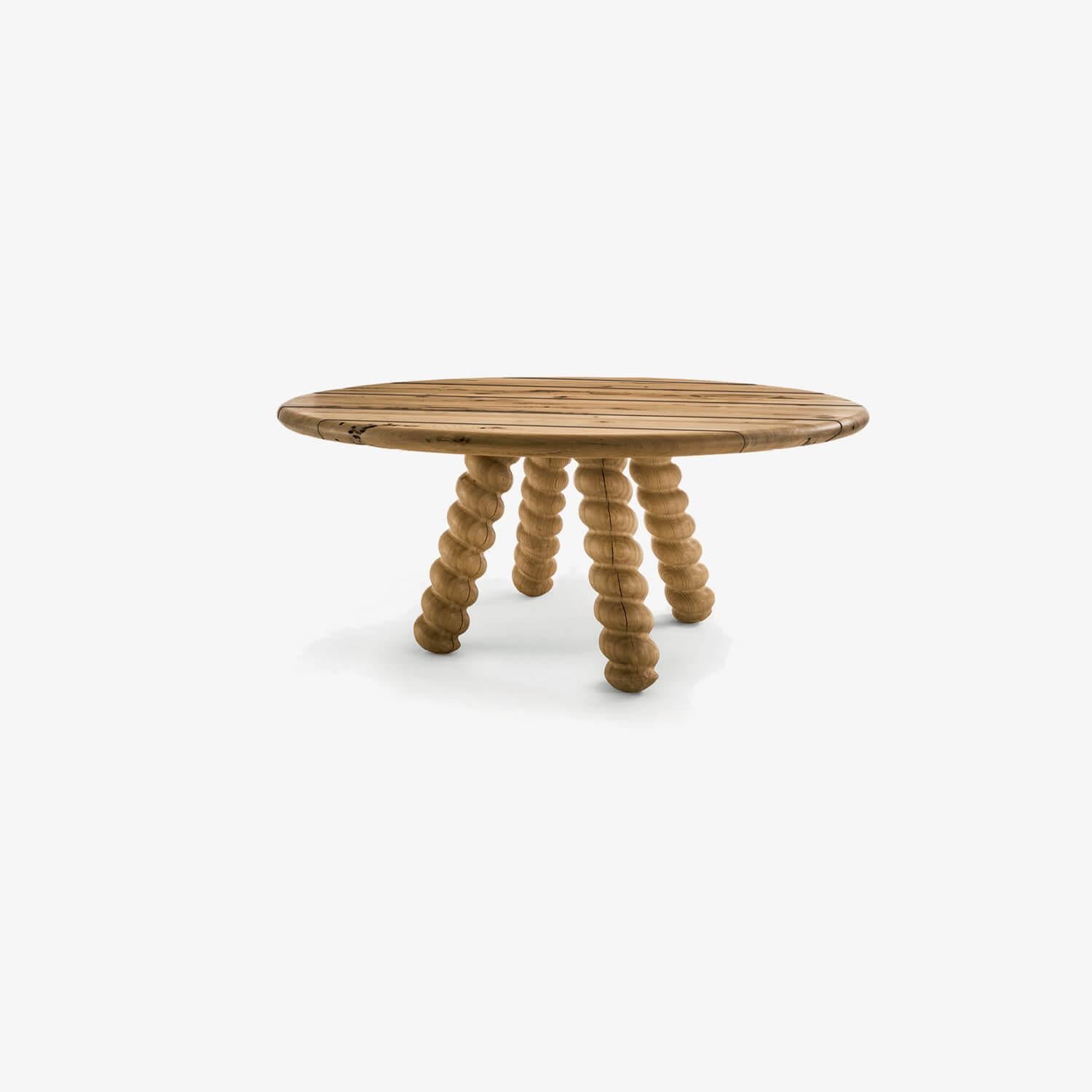 Round table with top in Briccola in planks, not glued, and 4 oak legs turned in form of a spiral, placed in the middle and oblique