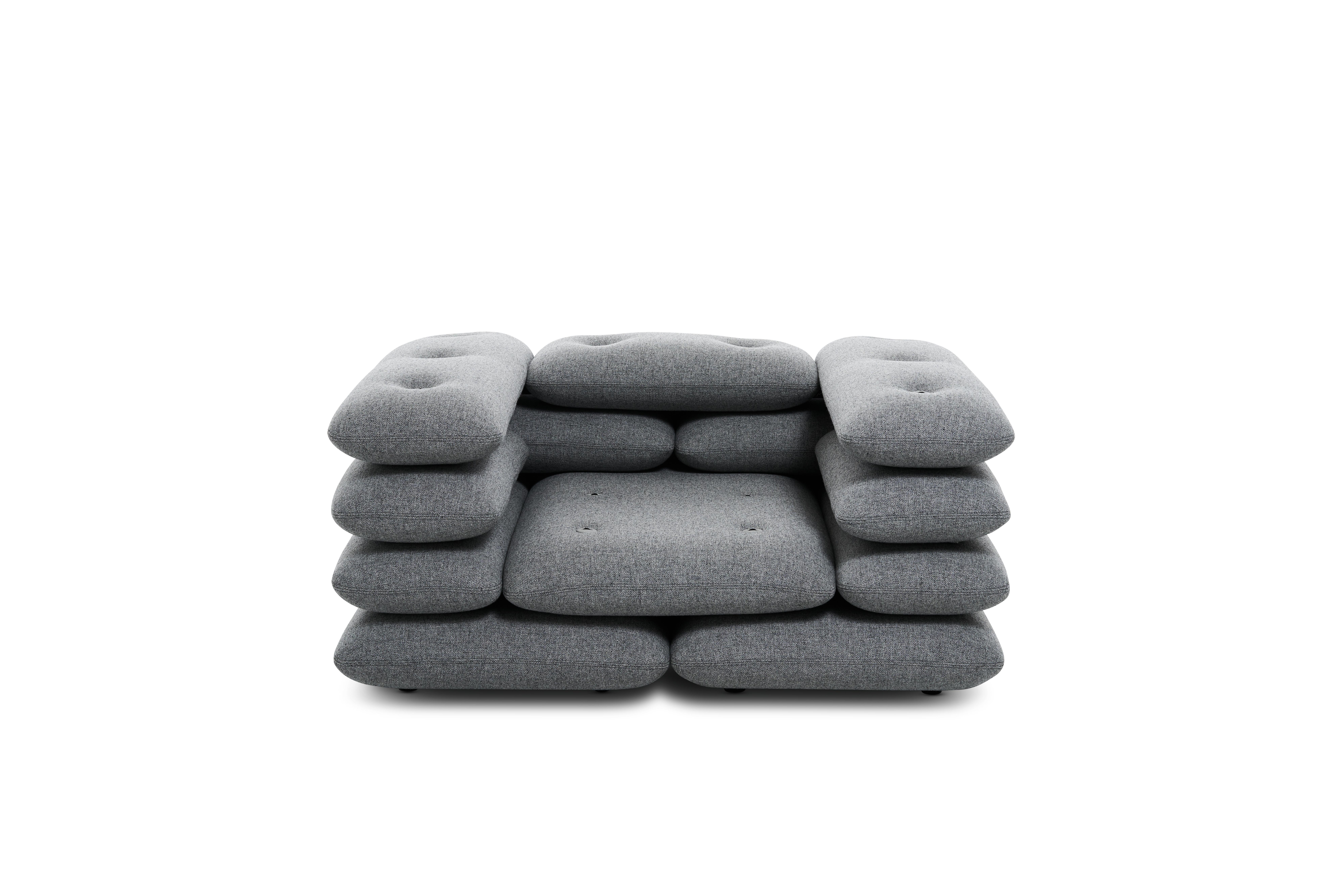 Sand bag like cushions made of upholstered foam. Bricklaying design fixed up with tailor quality buttons made of fiber concrete and tied up with rope. 

Upholstery :
Kvadrat Hallingdal 65 - 110
Kvadrat Hallingdal 65 - 130
Kvadrat Hallingdal 65