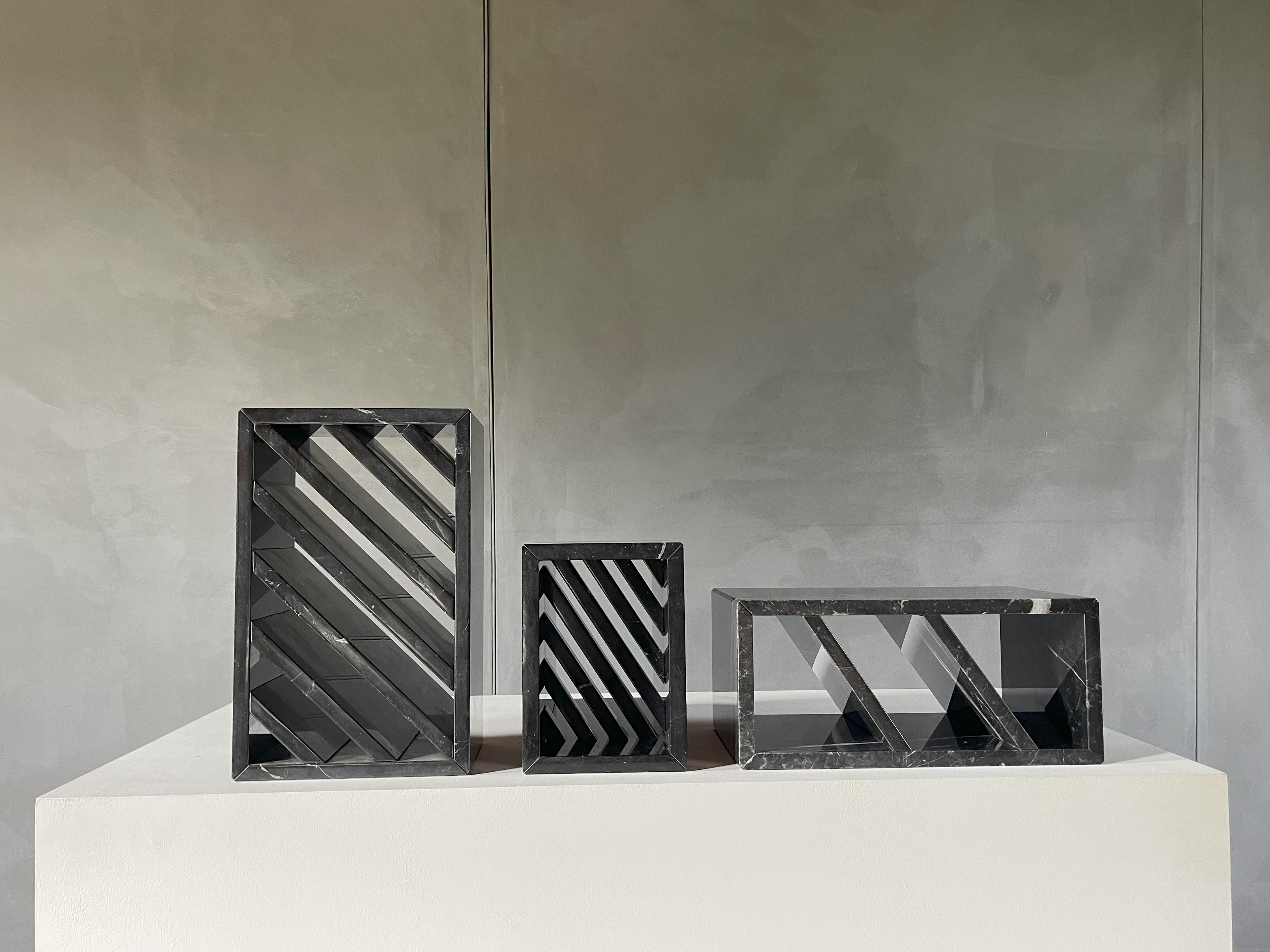 BRICK III Side Table / Grégoire de Lafforest
2014 / Nero Marquina marble
26 x 19 x h. 42

Bedside table, magazine rack, mini bookshelf, side table, tidy… Brick is plural. A tribute to the architectural modules, a precious and precise review of