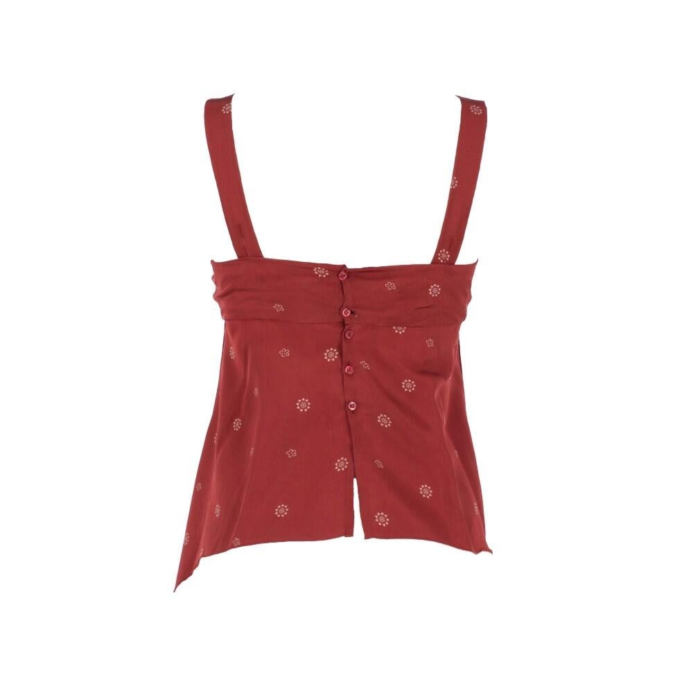 Brick red Marithé + François Girbaud 2000s crop top with floral print. V-neck, adjustable straps with rear buttons. Gathered neckline detail. Decorative pleats and elongated front flaps. Back buttoning.

Size: 40 IT

Flat measurements
Height: 53