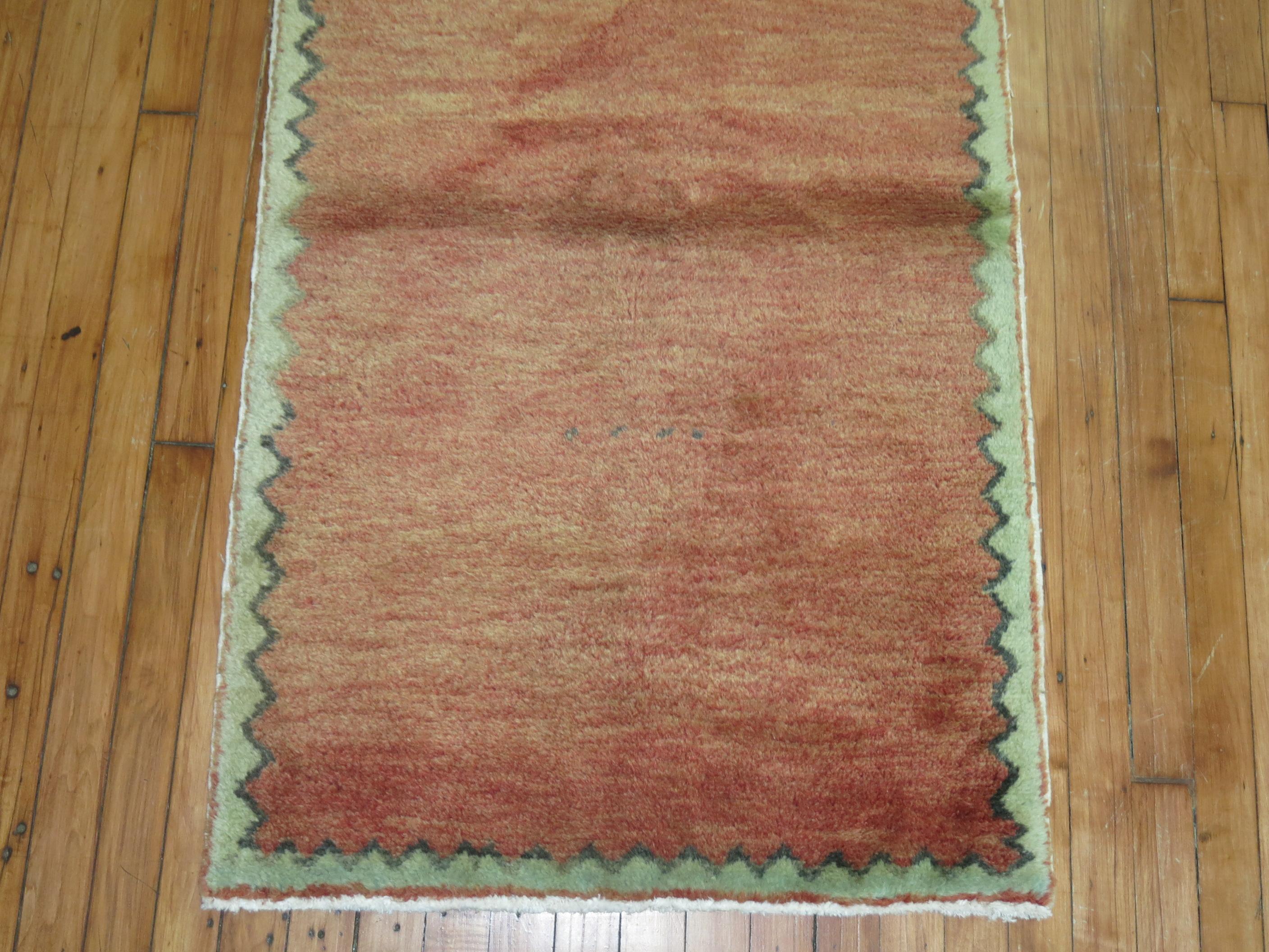 One of a kind mid-20th century Turkish modernist style rug in brick red. Border is in soft green

Measures: 2'6