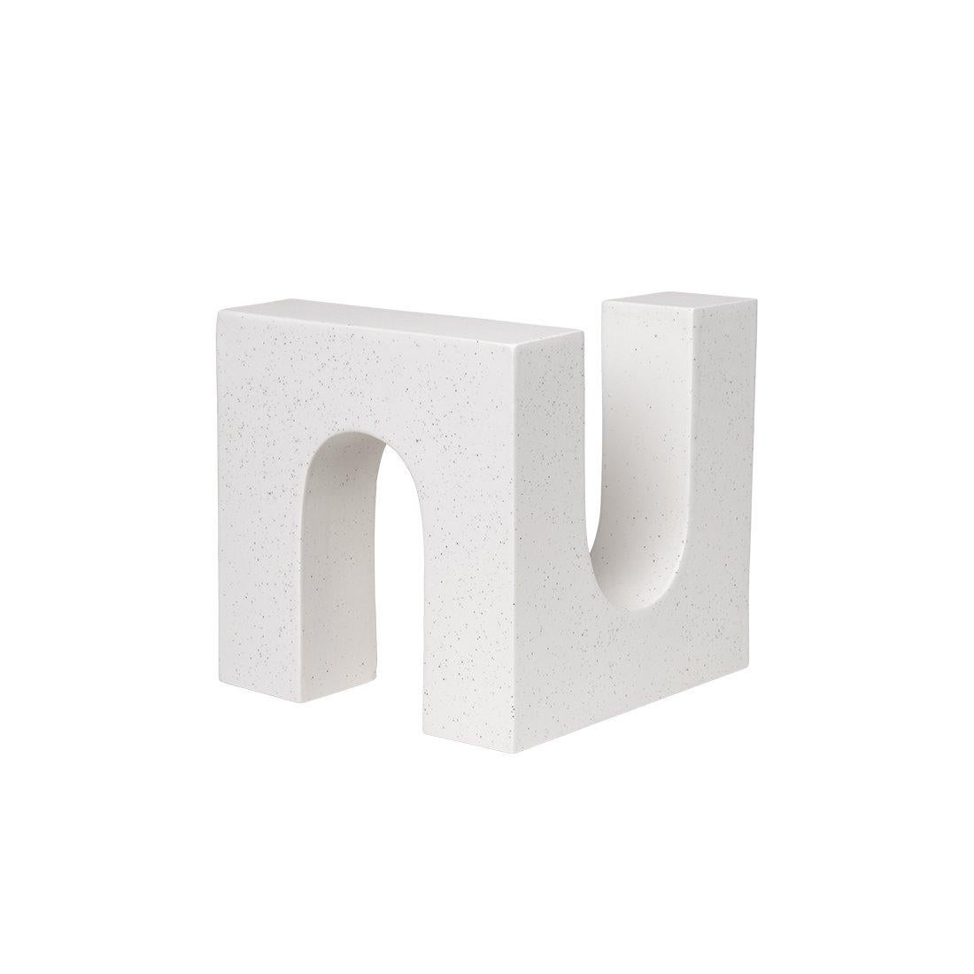 Brick sculpture by Kristina Dam Studio
Materials: Off-white ceramic with glazing. 
Dimensions: 20 x 20 x H 20cm.

A single, unbroken line emanating from one starting point and continuing in the infinite. Inspired by the architectural lines of