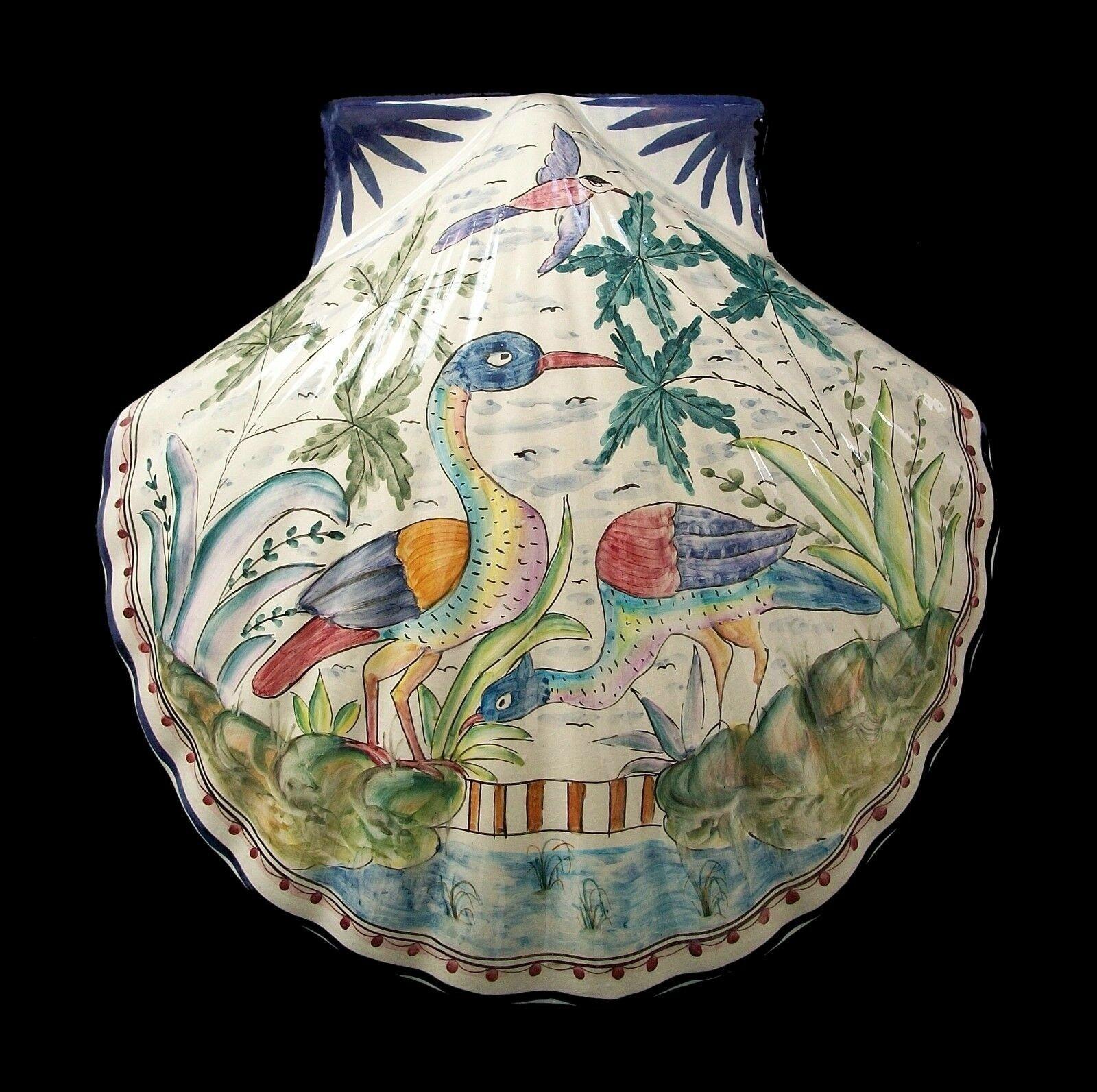 BRICOLARTE - Rare hand painted shell form majolica wall decoration - artist signed - Portugal (Pombal) - mid 20th century. 

Excellent vintage condition - no loss - no damage - no repairs - minor glaze crackle from age and use - ready to