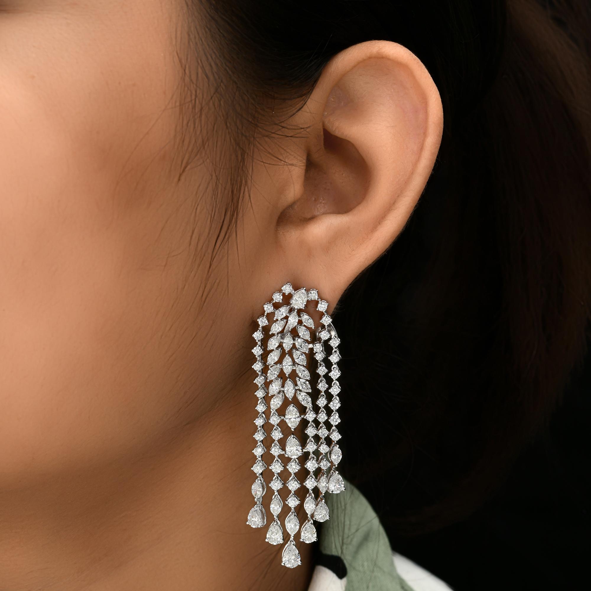 Bridal 18 Karat White Gold Mixed Shape 10.83 Diamond Chandelier Dangle Drop Earrings. 
The design features a lavish, leaf-like cluster at the top, transitioning into multiple, dazzling strands of diamonds that create a liquid waterfall effect.