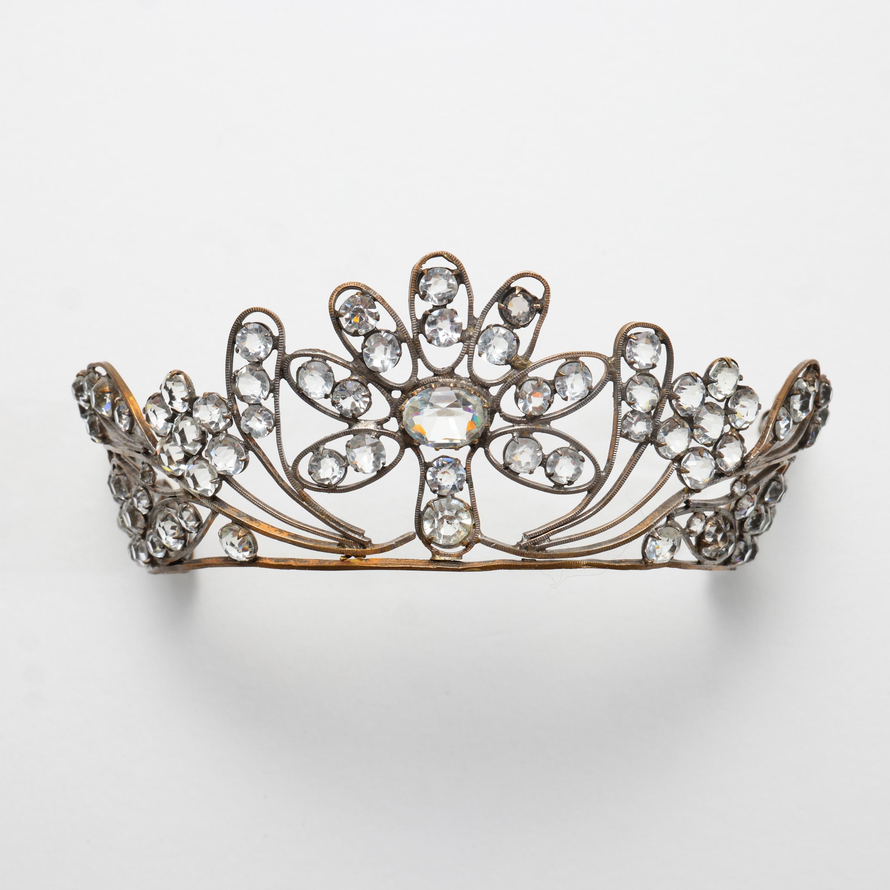 This exquisite bridal tiara -created around 1820, features a fire-gilded framework, intricate and highly detailed, that has been set with numerous sparkling hand-faceted paste 