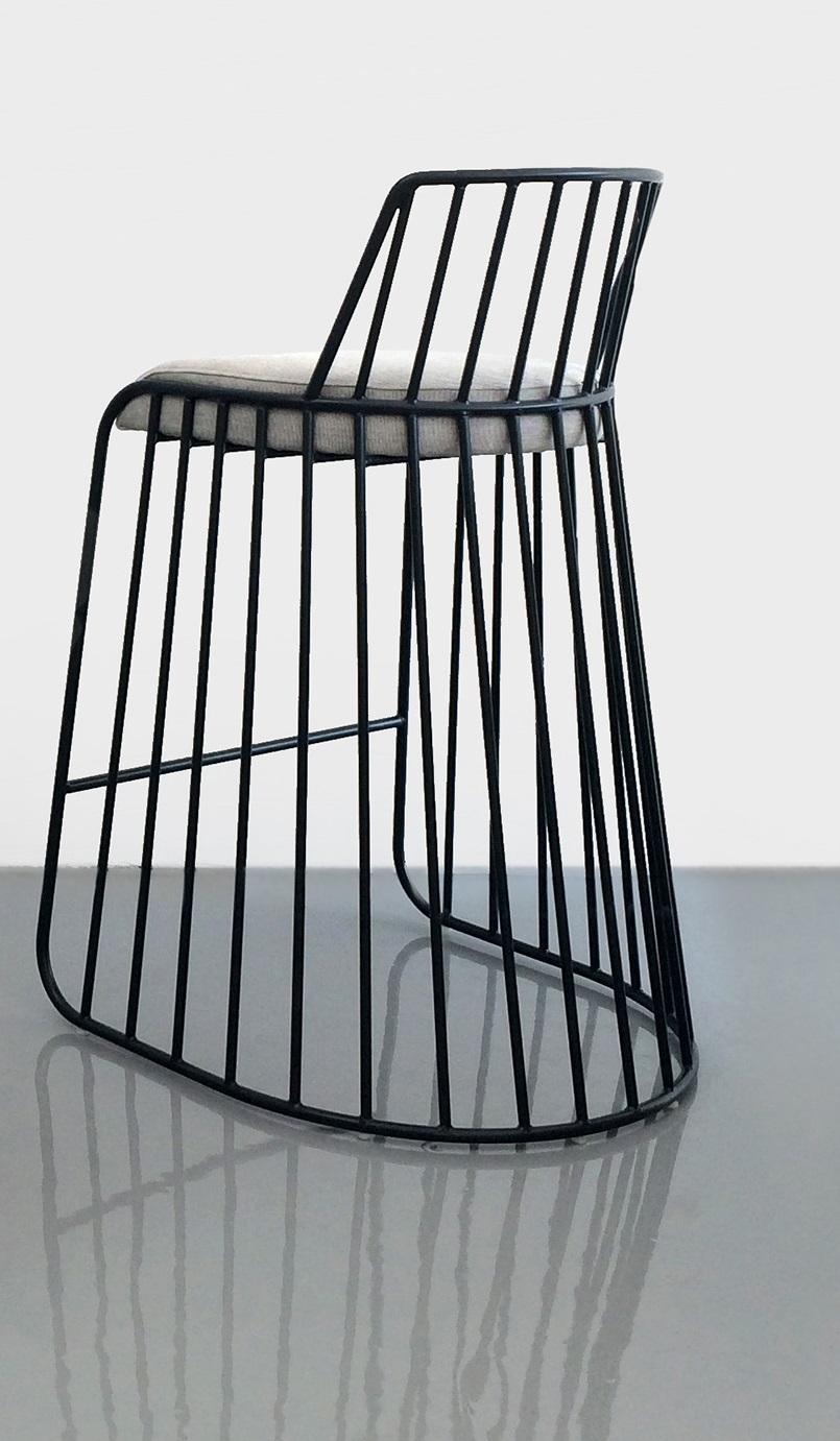 Bride’s Veil Counter Stool With Back by Phase Design
Dimensions: D 52,1 x W 53,3 x H 83,8 cm.
Materials: Upholstery and powder-coated steel.

Solid steel bar available in a smoked brass, polished chrome, burnt copper, or powder coat finish with