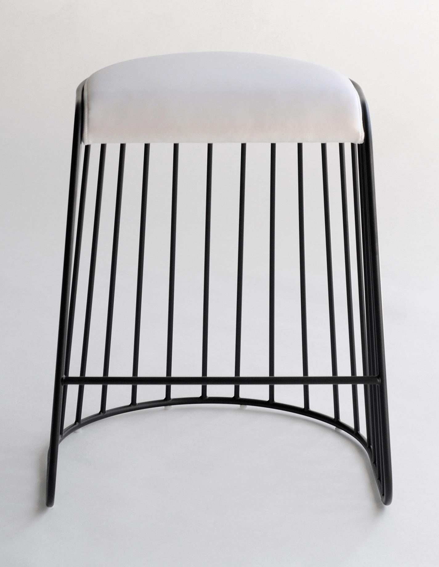 Bride’s Veil Counter Stool by Phase Design
Dimensions: D 52,1 x W 53,3 x H 63,5 cm.
Materials: Leather and powder-coated steel.

Solid steel bar available in a smoked brass, polished chrome, burnt copper, or powder coat finish with upholstered top.